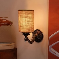 Devansh Metal Electric Wall Light in Antique Gold Colour with Beige Shade Count of 1 Light