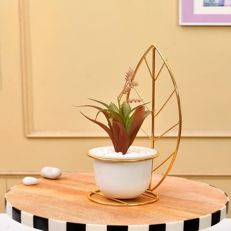 Red And Green Artificial Plant With White And Gold Ceramic Pot