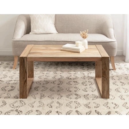 Cleburn Rectangle Living Room Coffee Table with Solid Mango Wood Design