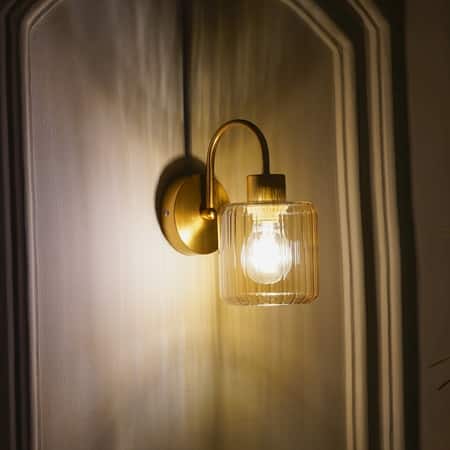 Hendrik Single Light Brass Wall Fitting with Amber Glass