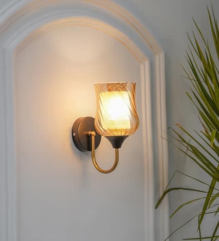 Florian Single Light Wall Fitting In Black And Brass Finish Metal With Amber Glass