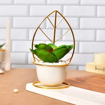 Green Leafy Artificial Plant With White And Gold Ceramic Pot