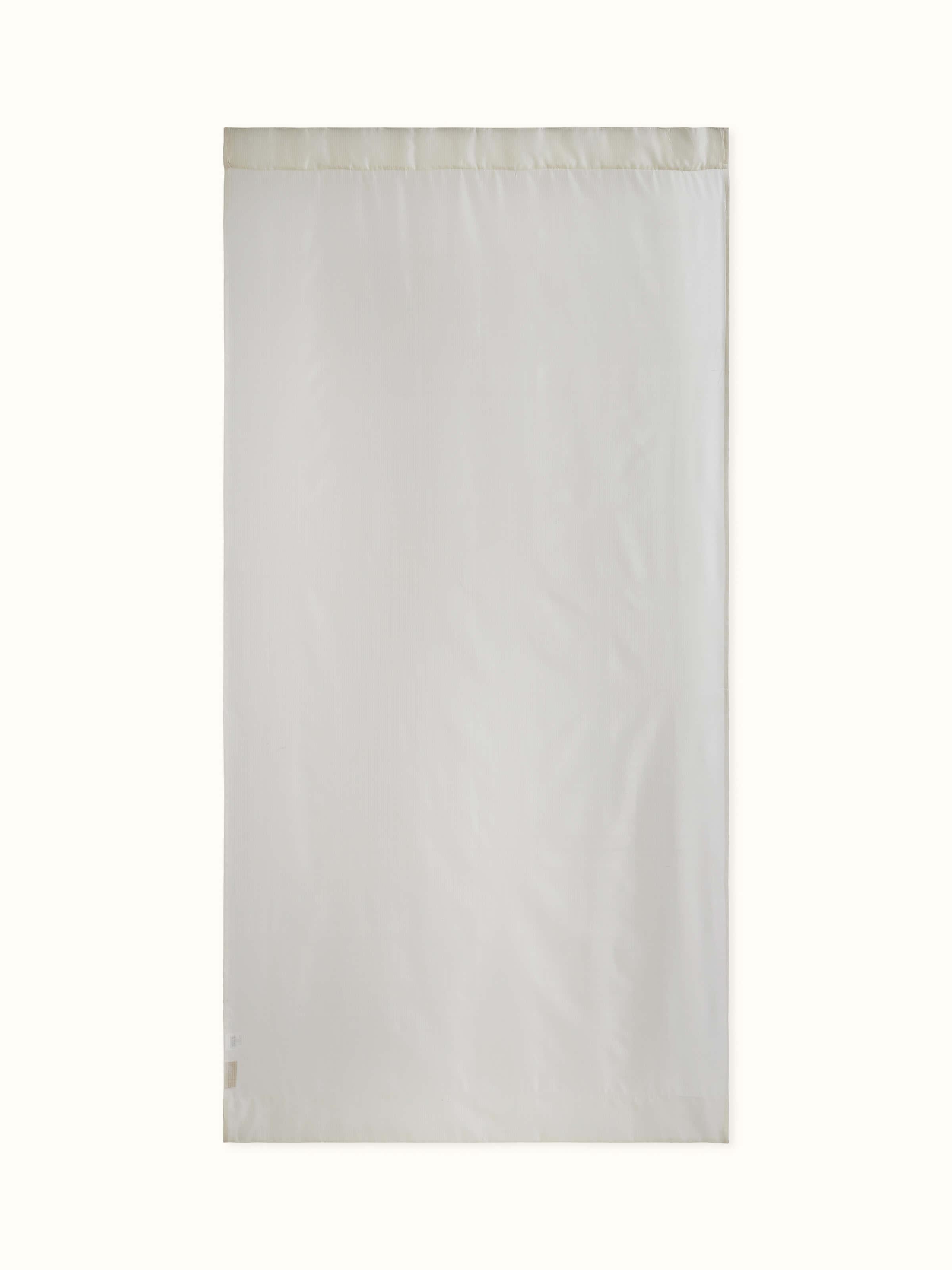 Front view of sheer ivory Maheshwari curtain with textured silk cotton blend.