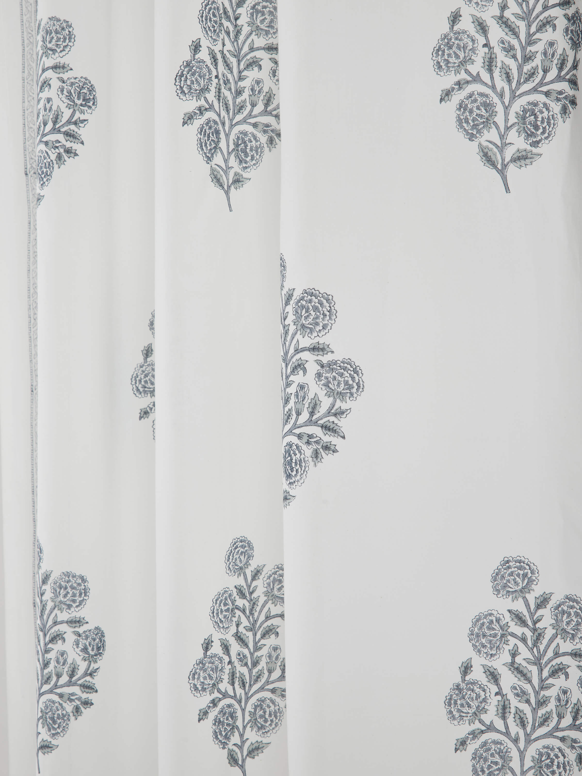 Angled view of Saha Grey Floral Sanganeri Sheer Curtain, showing flowy drape and hand block print.