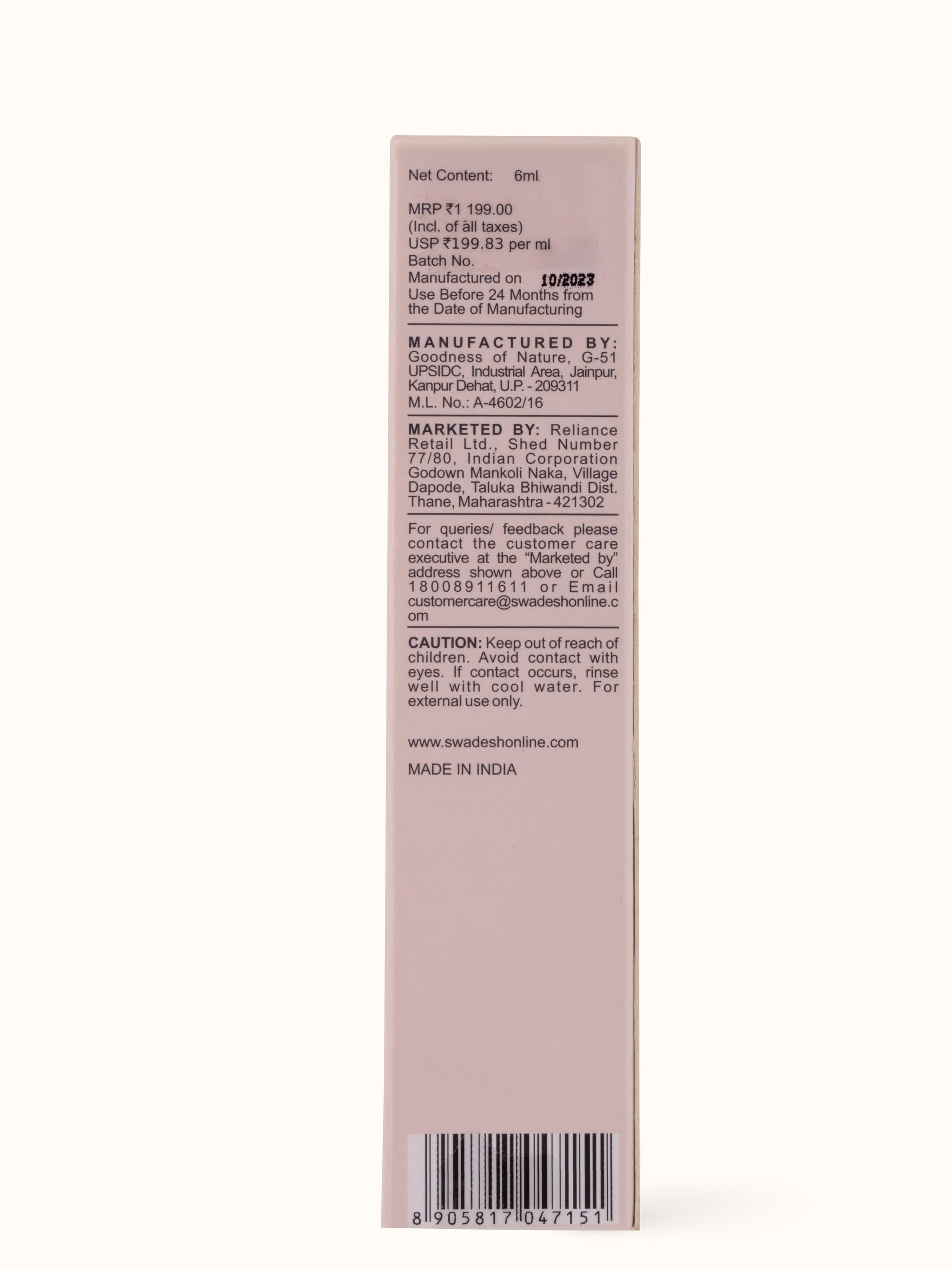 Back view of Lip Oil Sweet Orange featuring the ingredient list and product details