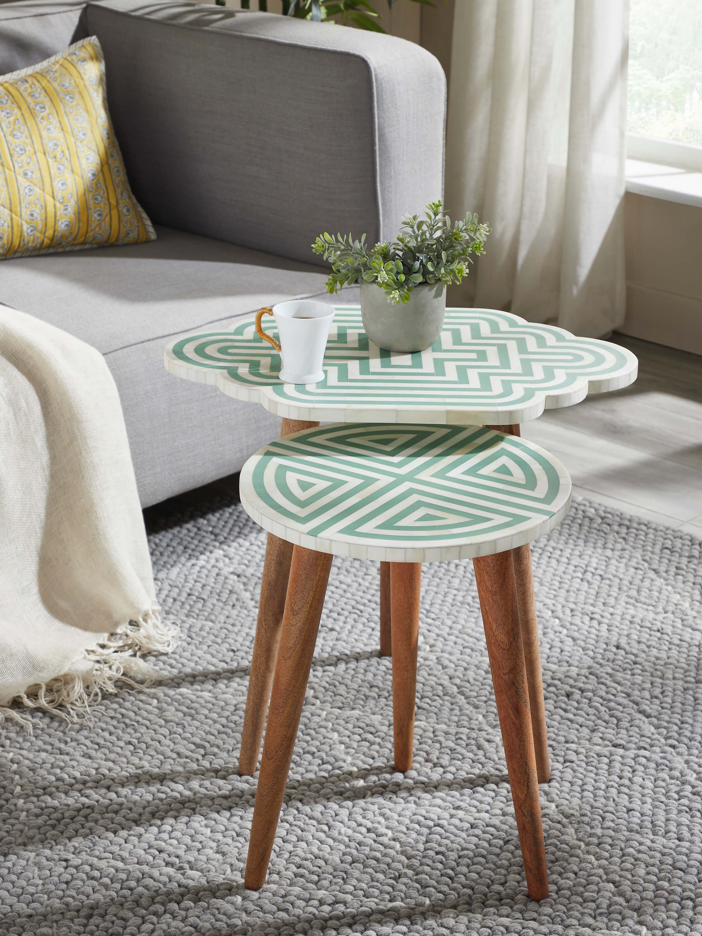 Side view of Grey Acacia Wood Bone Inlay Nesting Tables (2 Pcs) highlighting the sleek design and fine craftsmanship.
