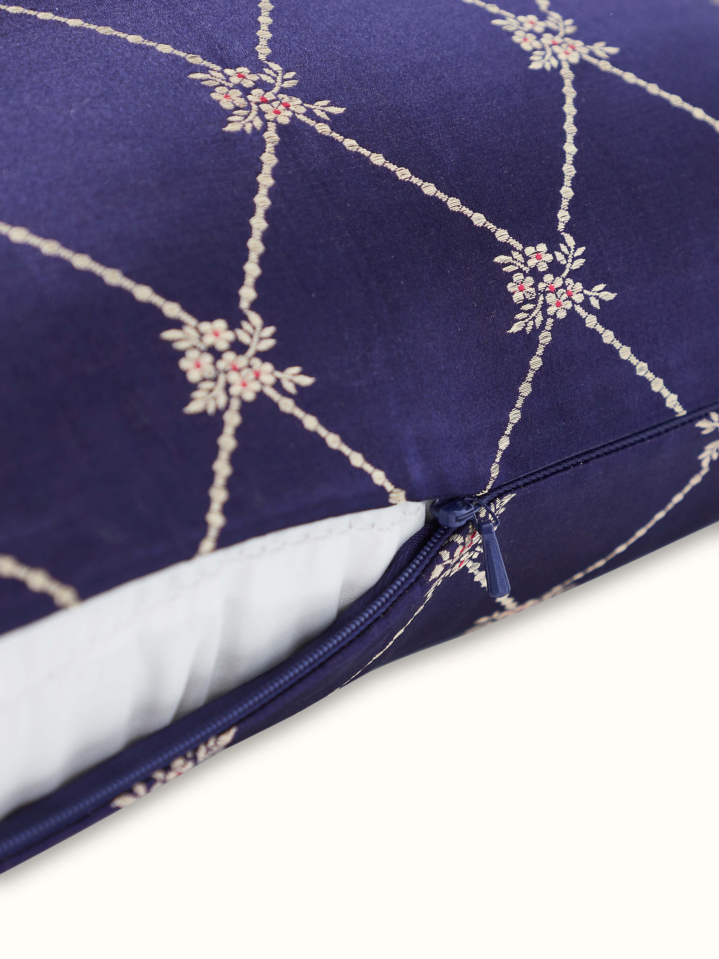 Angled close-up highlighting Banarasi weave details and lustrous silk finish.