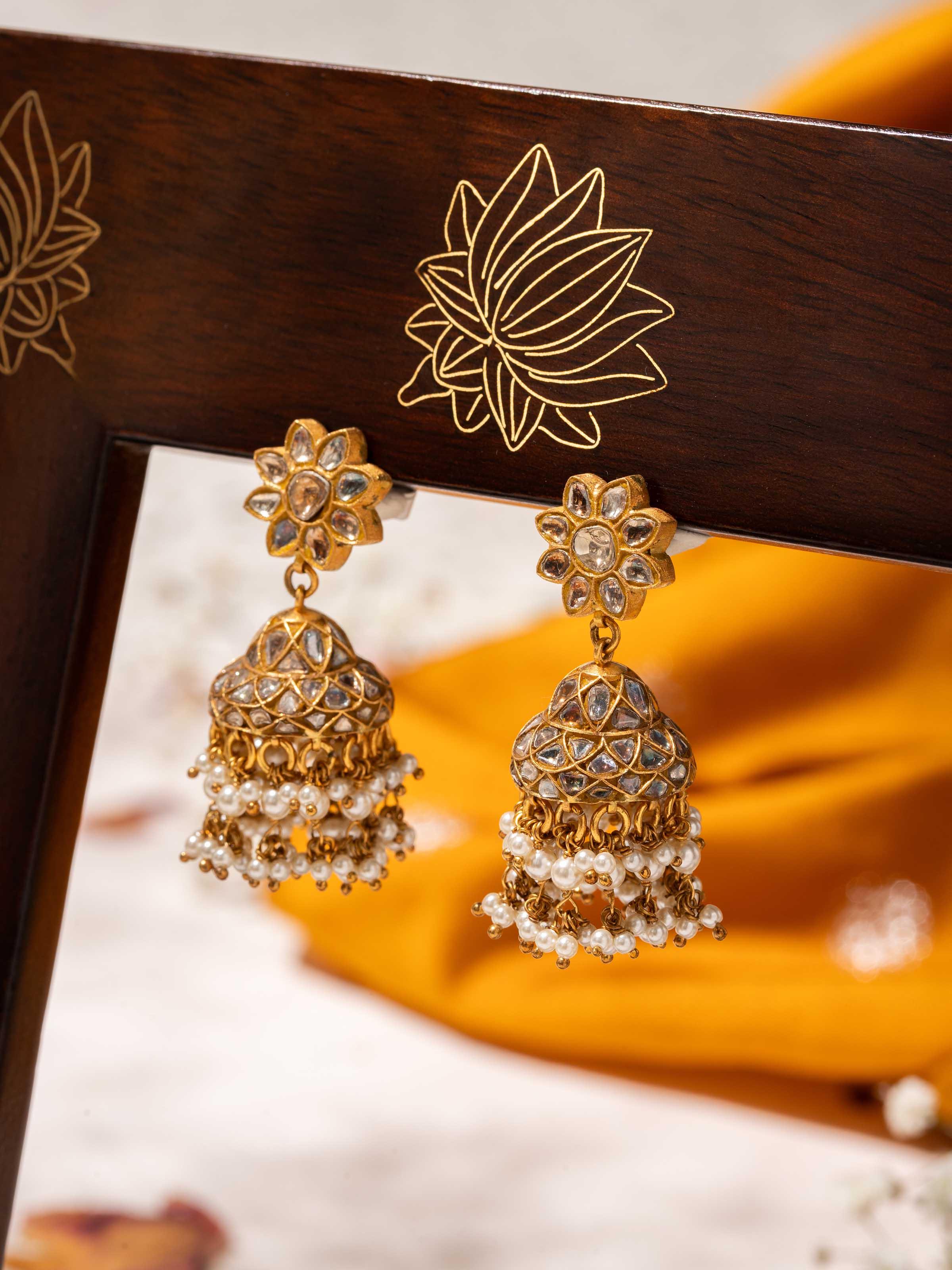 Alternate lifestyle view of Thappa gold jhumka featuring delicate hanging beads