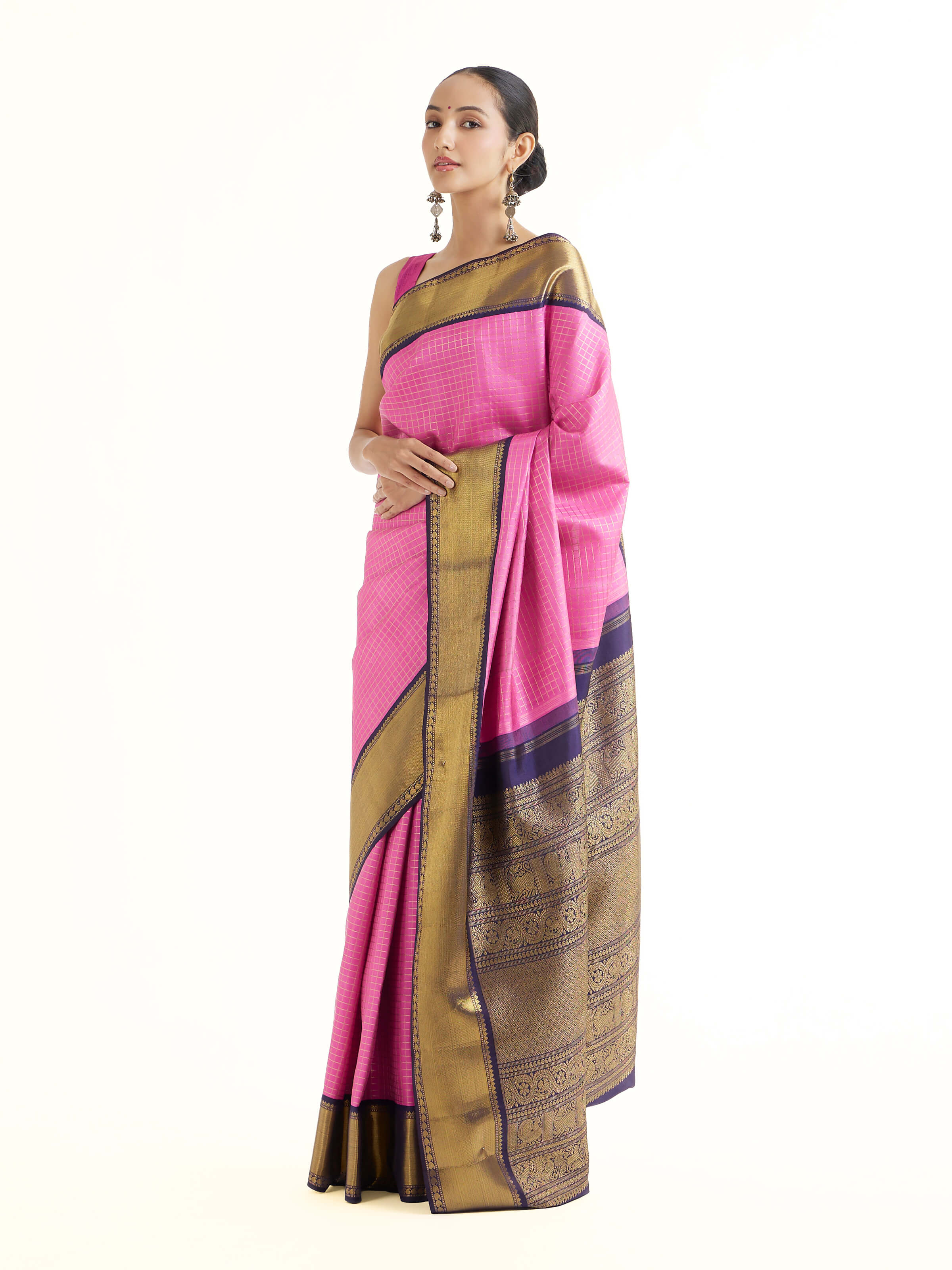Side view of mauve silk Kancheepuram saree with graceful drape and contrast border