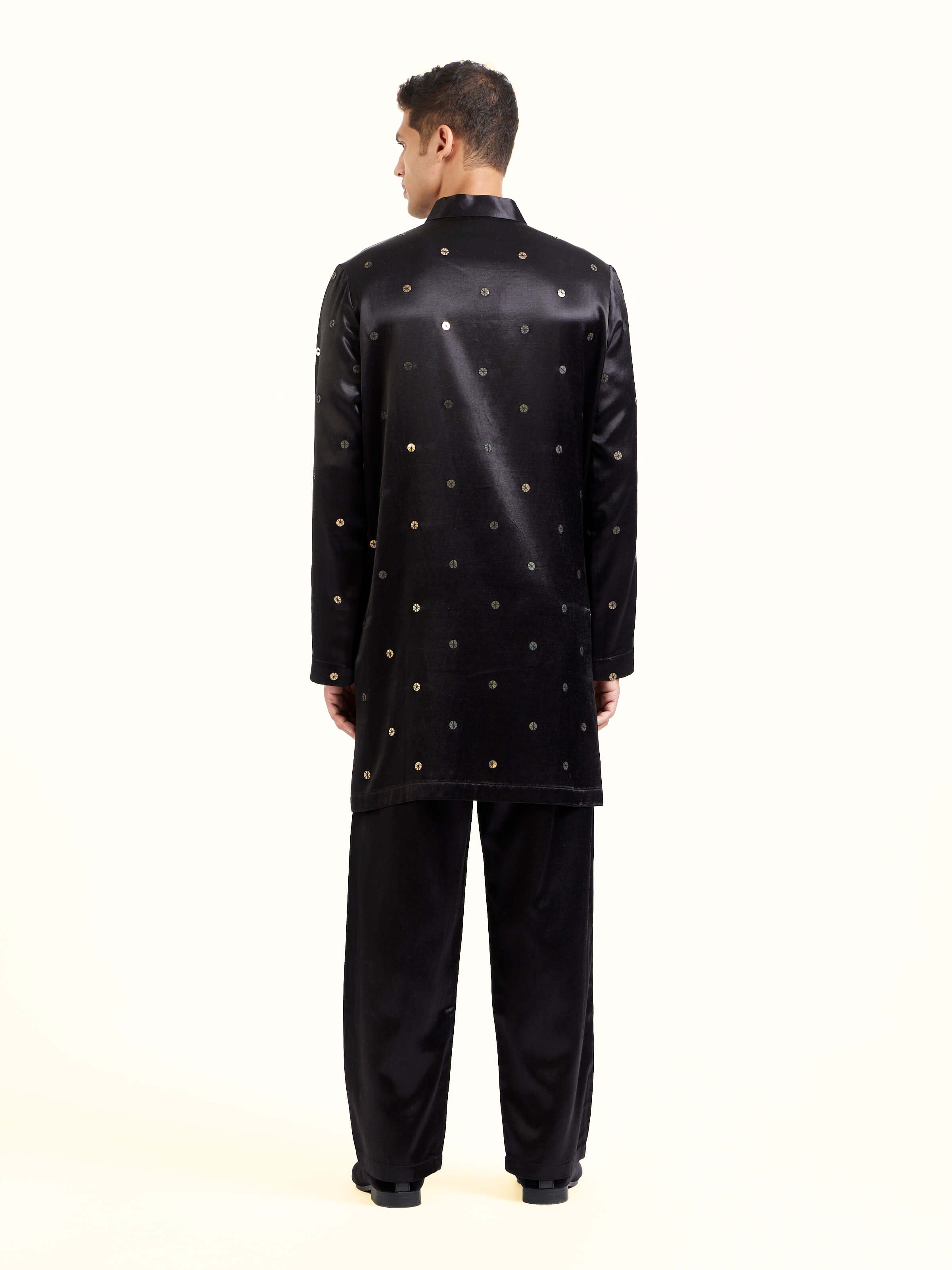 Back view of black hand embroidery long kurta displaying refined finish