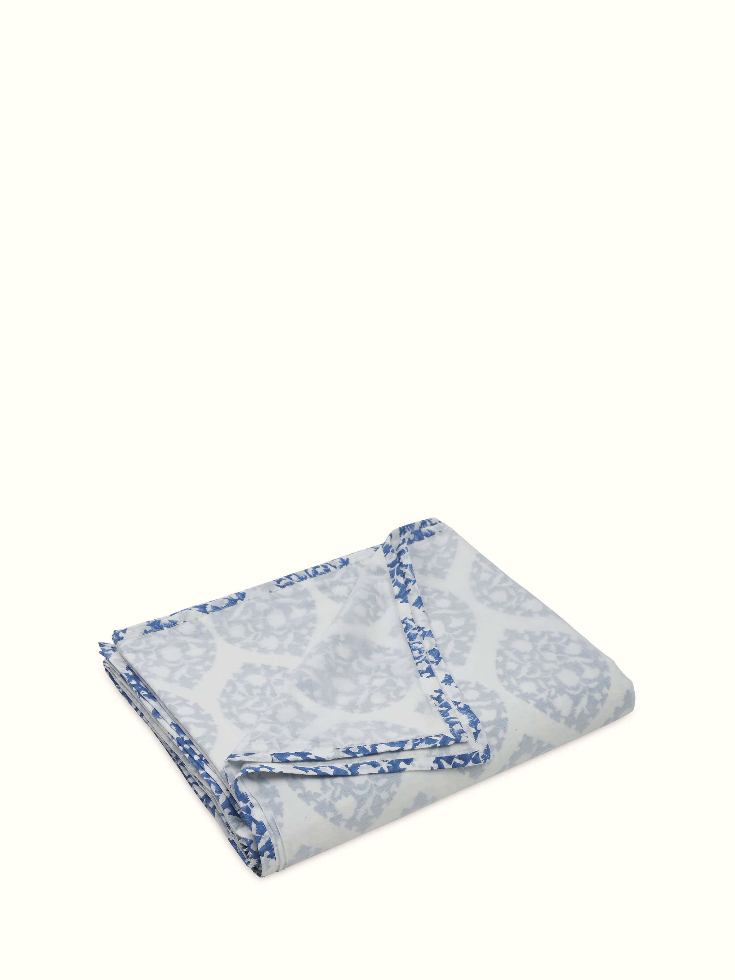 Angled view highlighting reversible print design and light cotton layering on Mihrab dohar