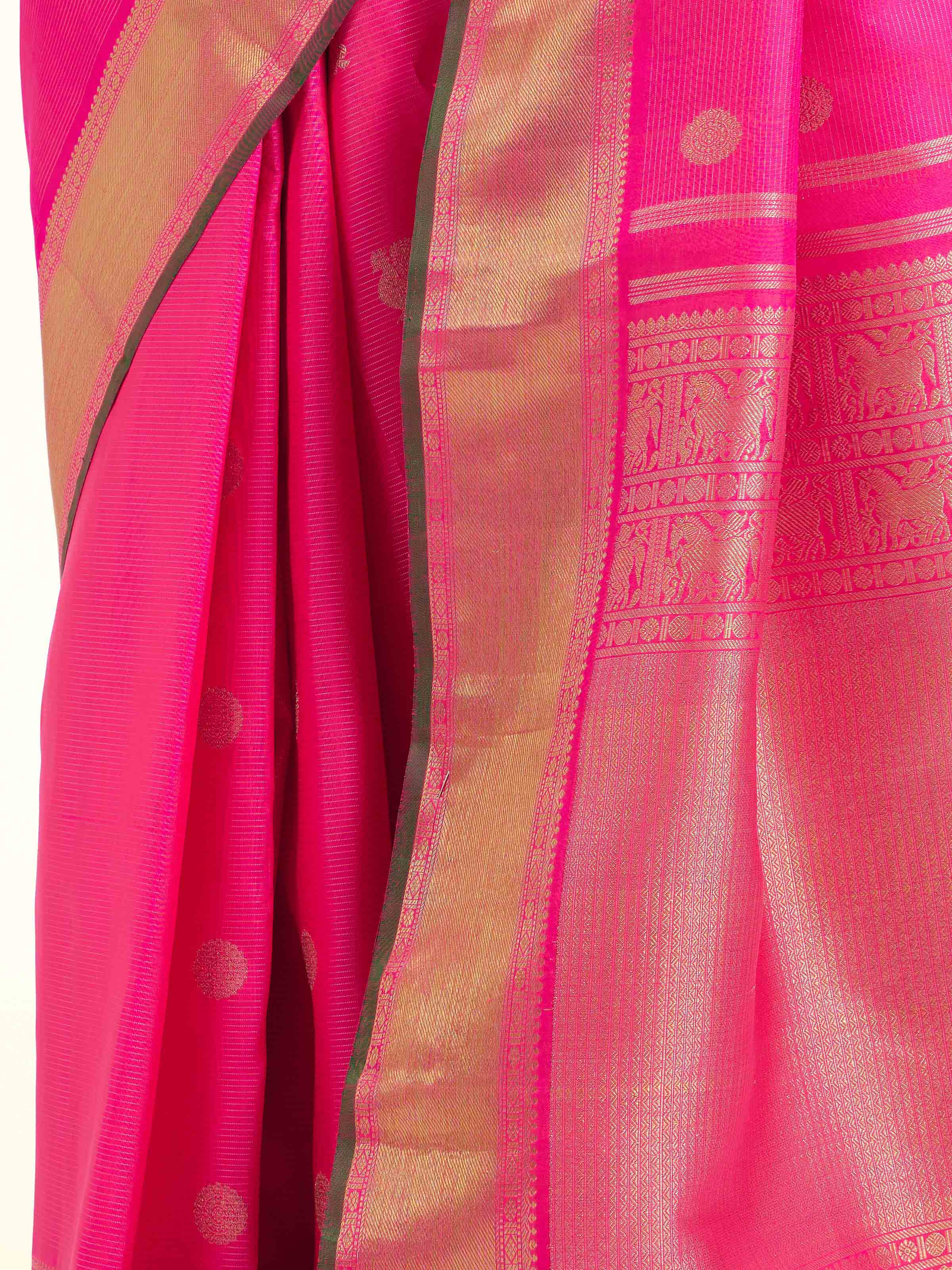 Detail view of pink silk Kancheepuram saree showing silk texture and weaving details