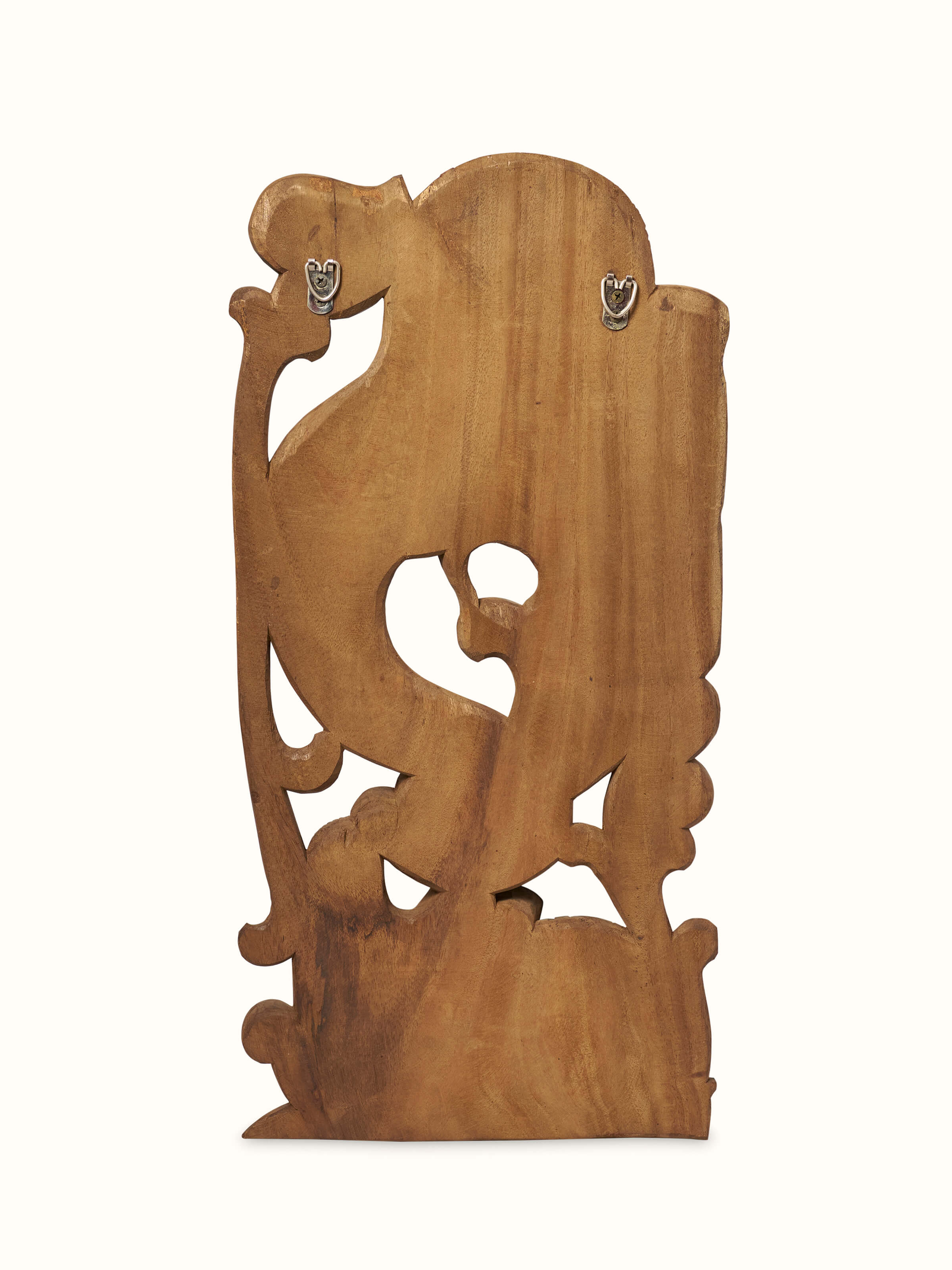 Back view of Tenali Carved Neem Wood Elephant Face Brackets Sculpture (2Pcs) by Swadesh showcasing the intricate carvings and craftsmanship.