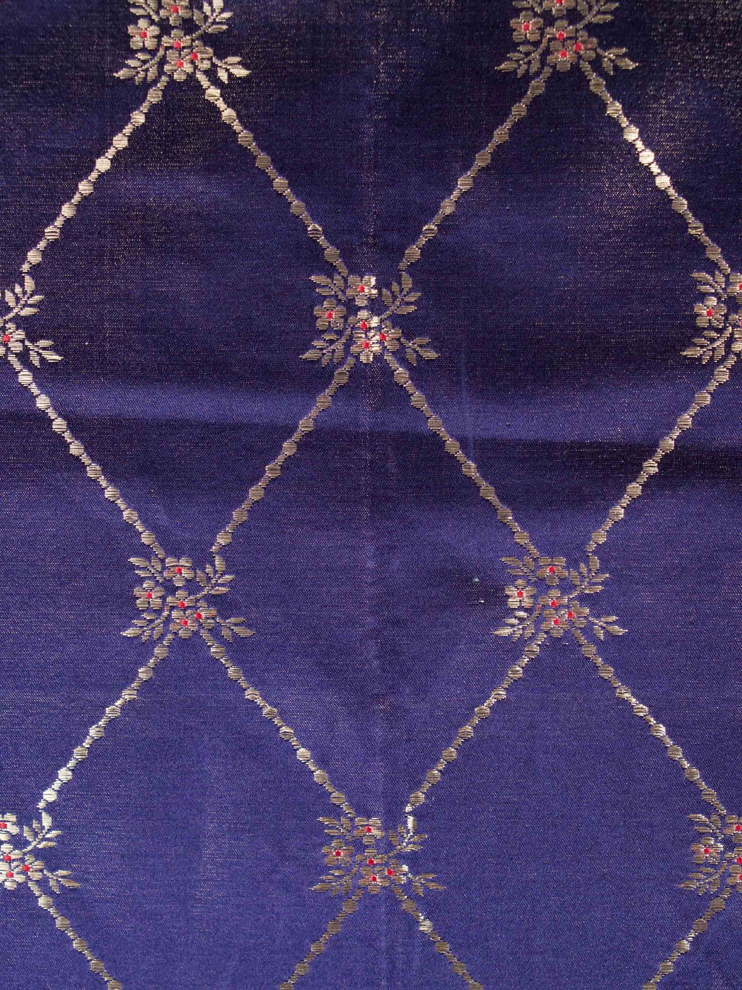 Close-up of brocade weave detail on Vanita navy blue silk table runner