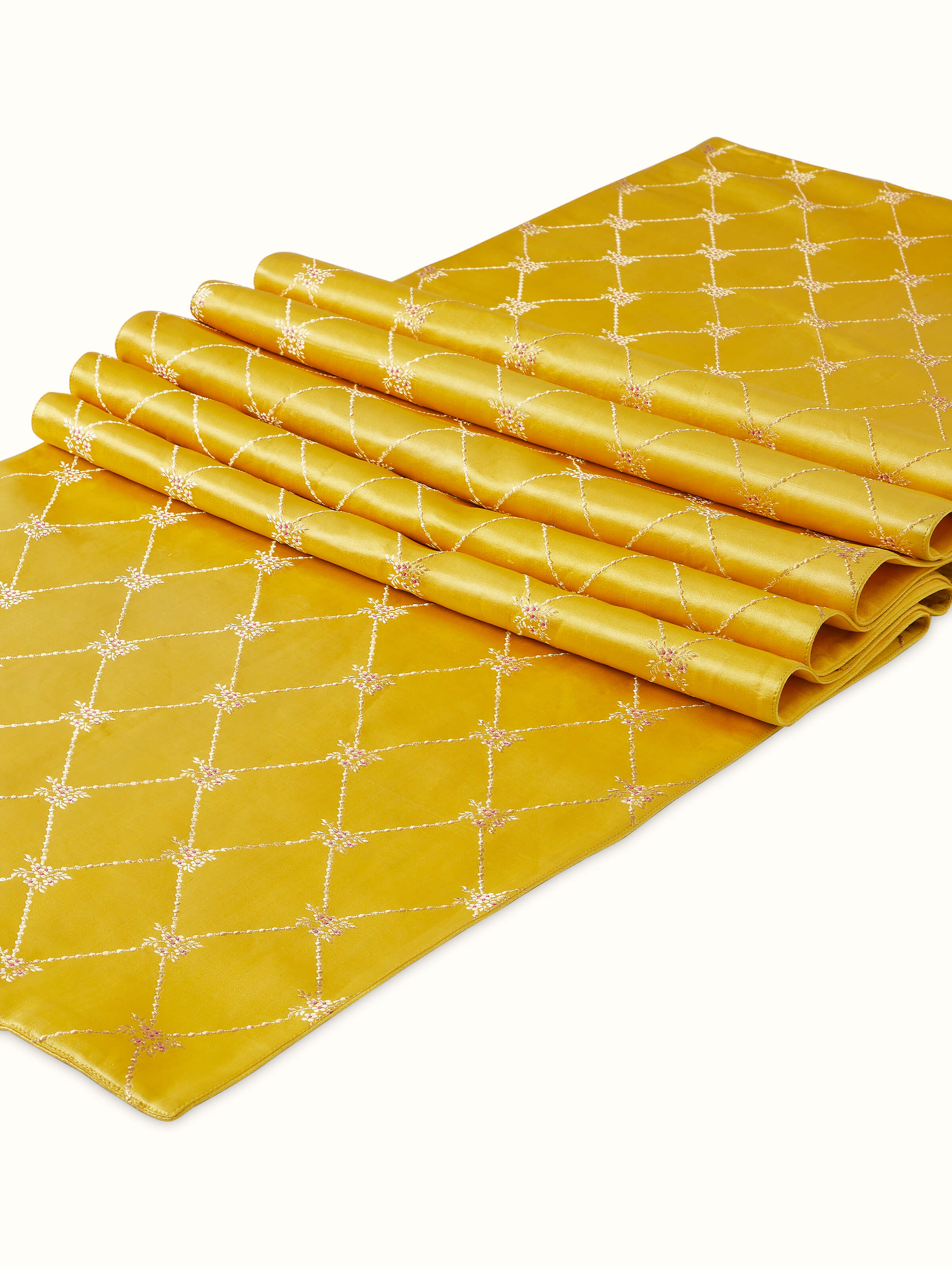 Angled view of Awadh Yellow Banarasi Handloom Silk Bed Runner, highlighting its intricate Banarasi patterns.