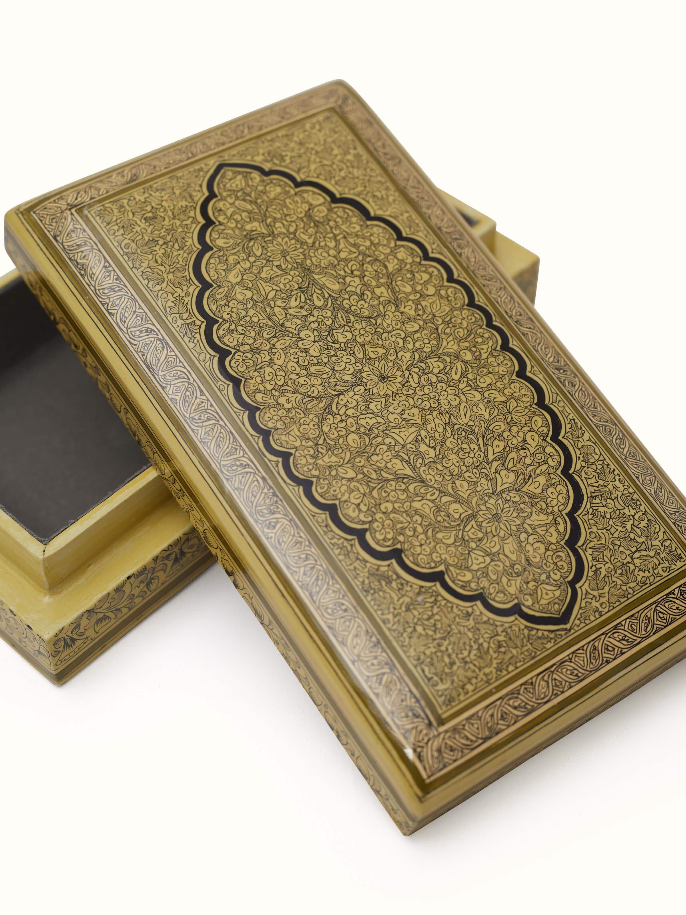 Angled view of Golden Papier Mache Paper Pulp Trinket Box emphasizing its refined details and luxurious appearance