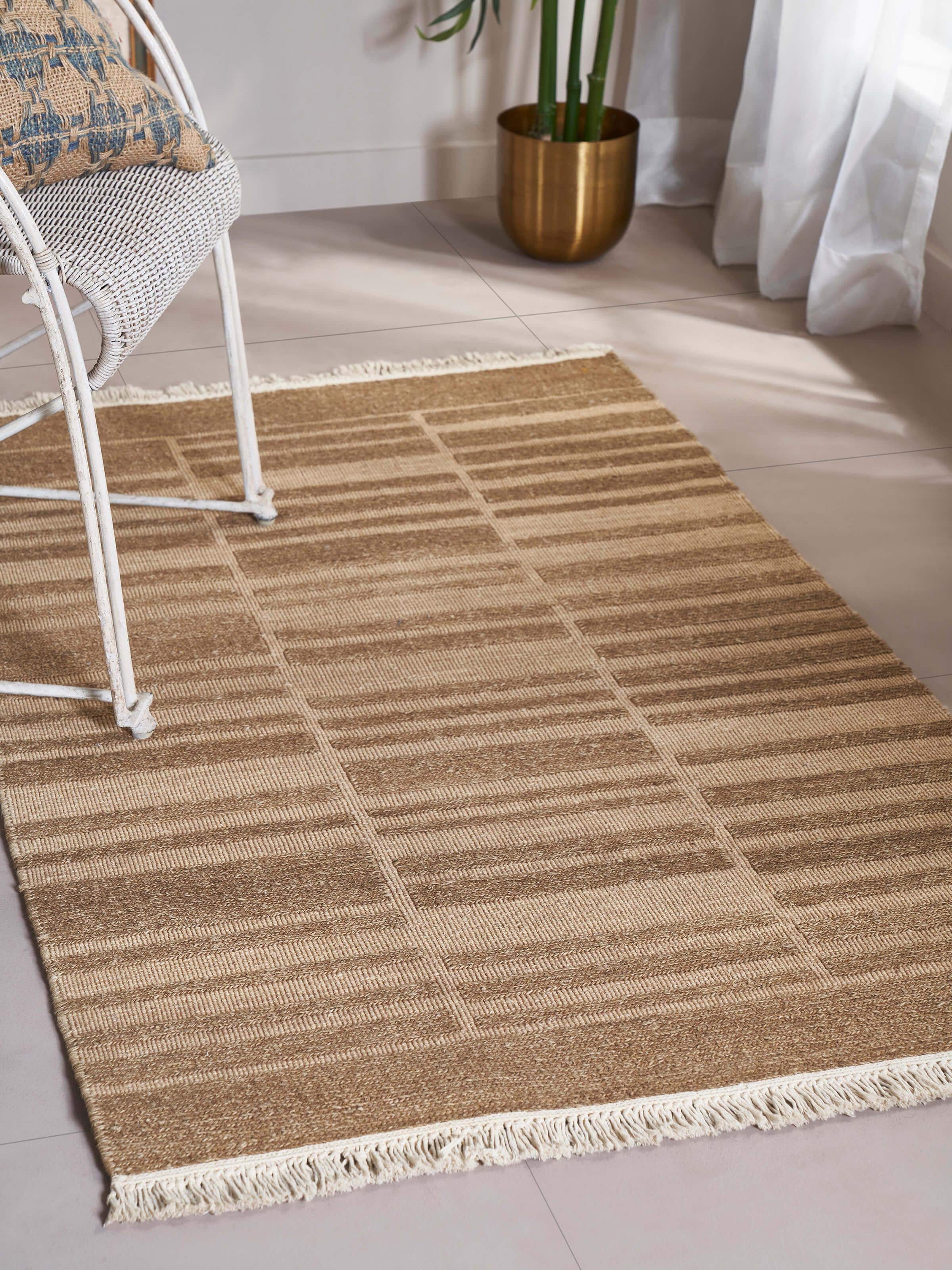 Top-down shot highlighting the overall pattern and fine hand-knotted details of the Sumak weave