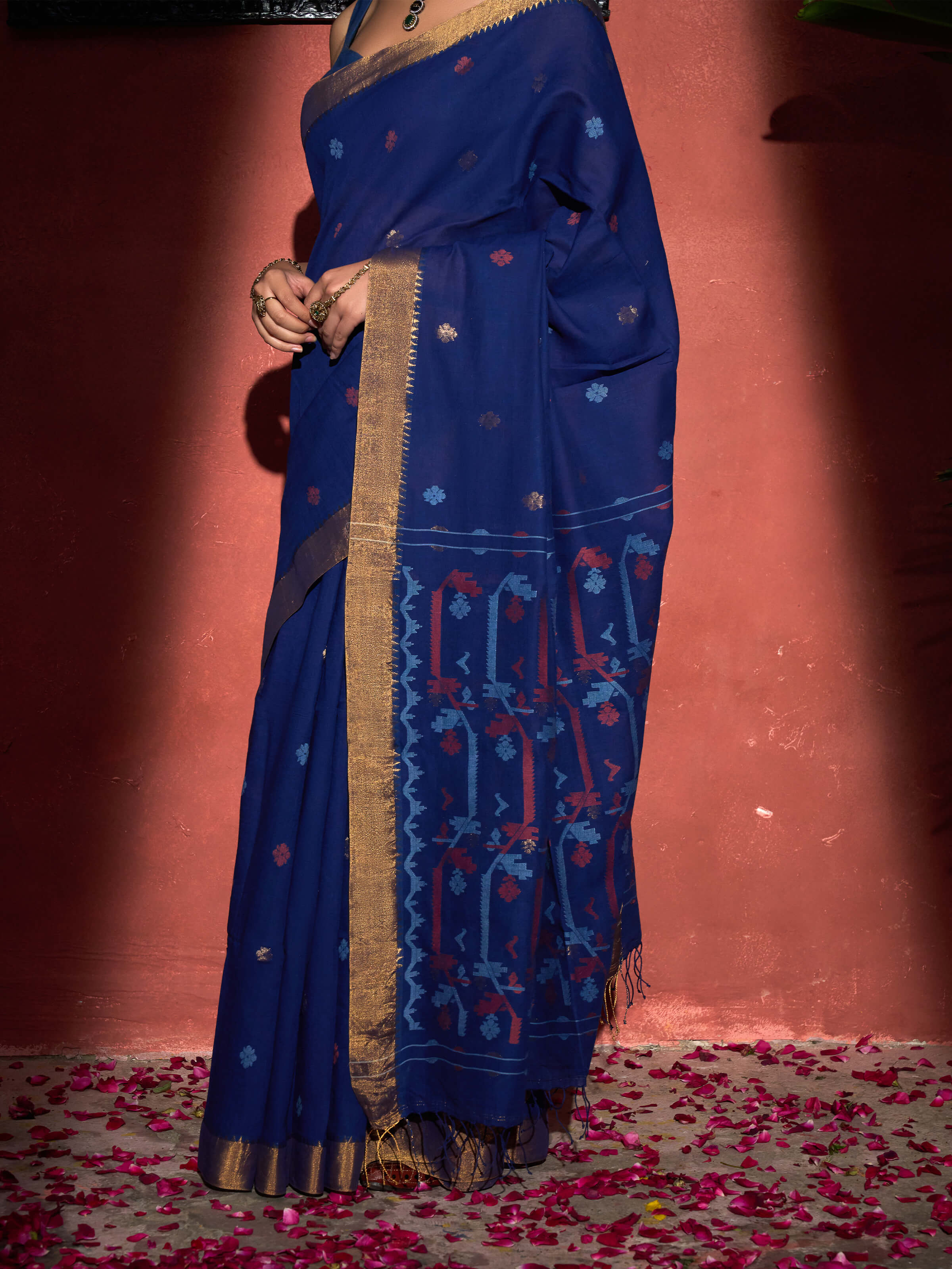 Detail view of blue muslin Jamdani saree showing weave and pattern