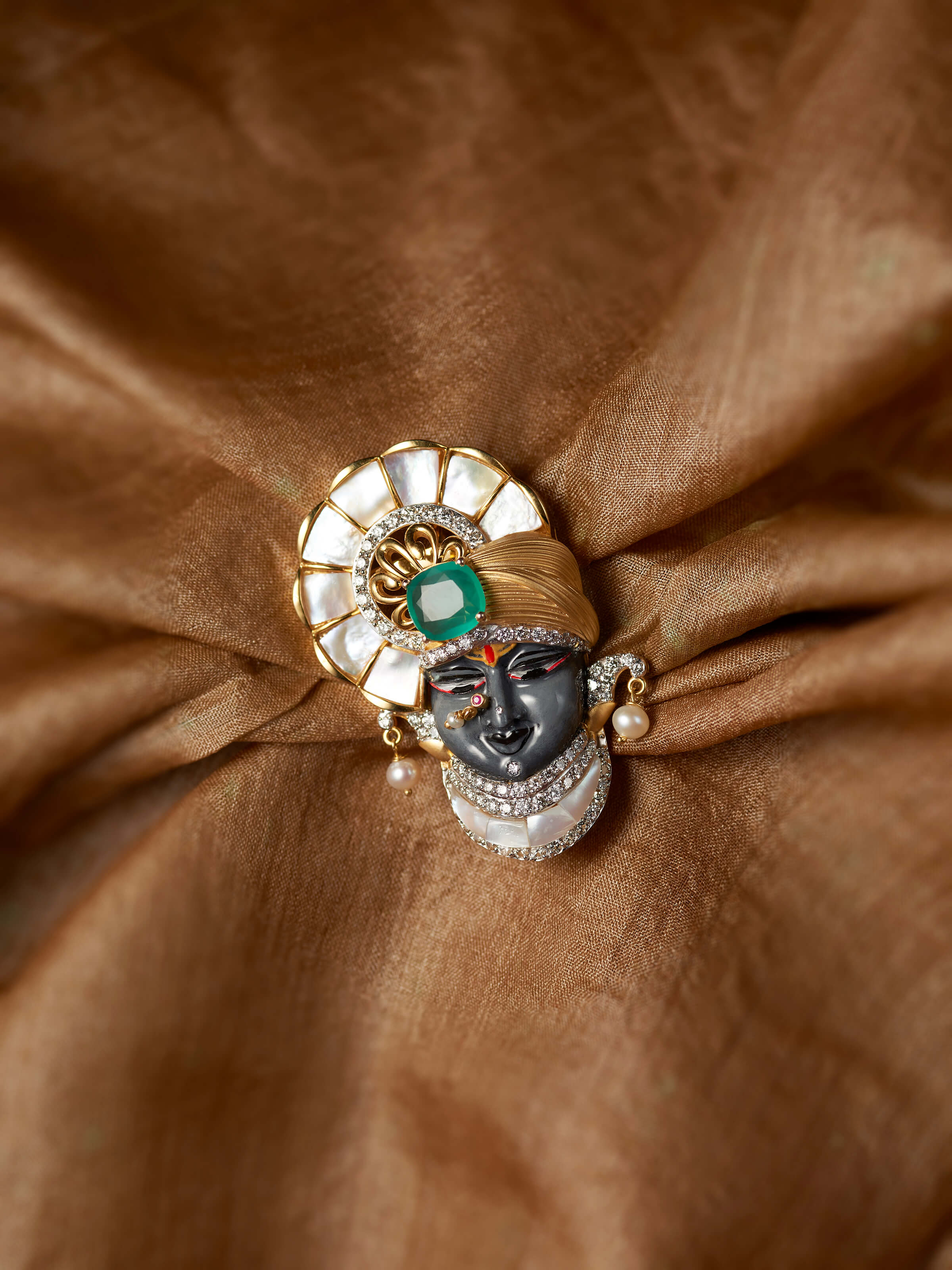 lifestyle view of open setting 14 karat gold brooch