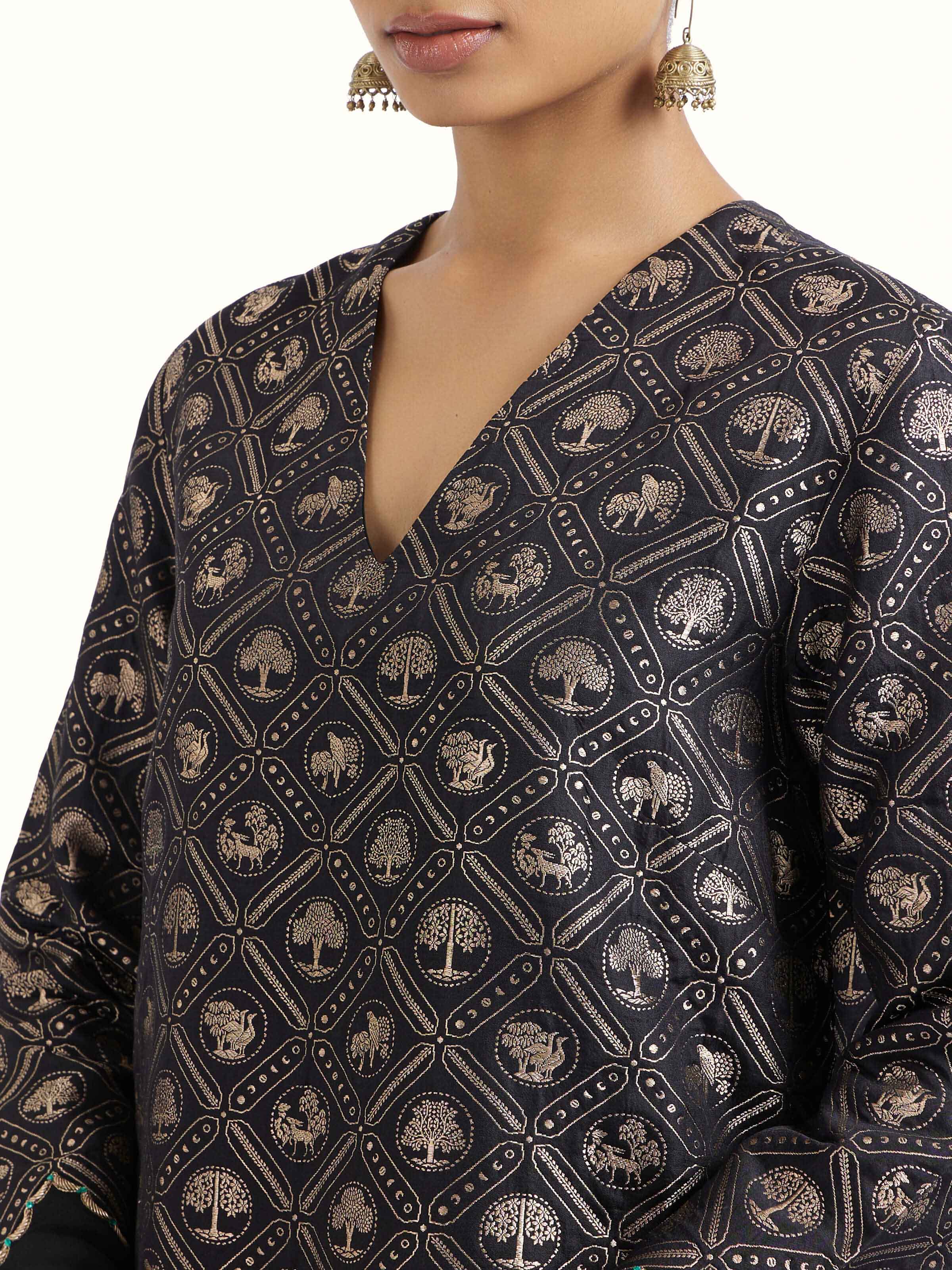 Detail view of black silk Banarasi kurta set showcasing craftsmanship