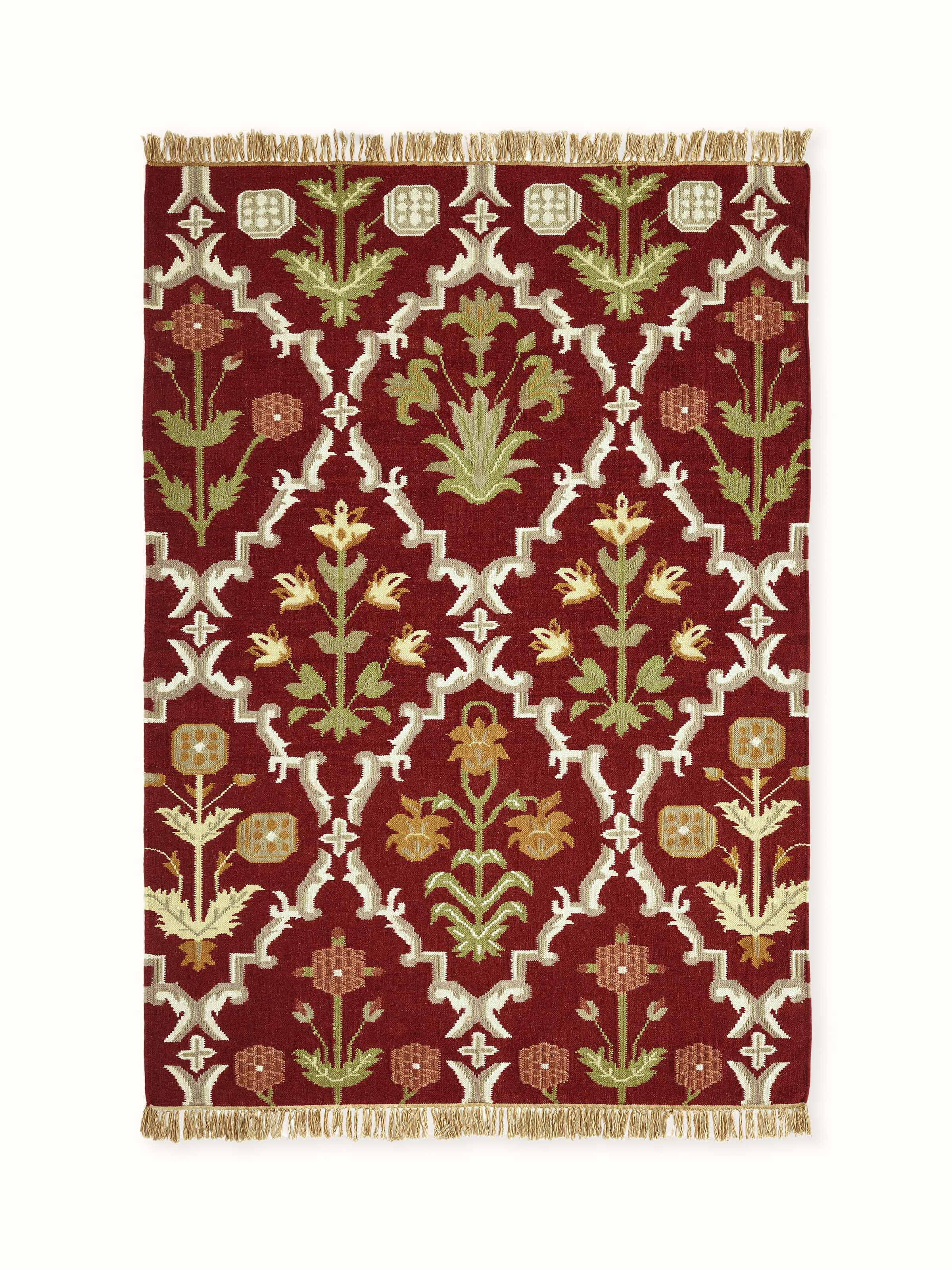 Front view of Mughal floral Kilim-style wool Panja dhurrie in traditional tones and motifs