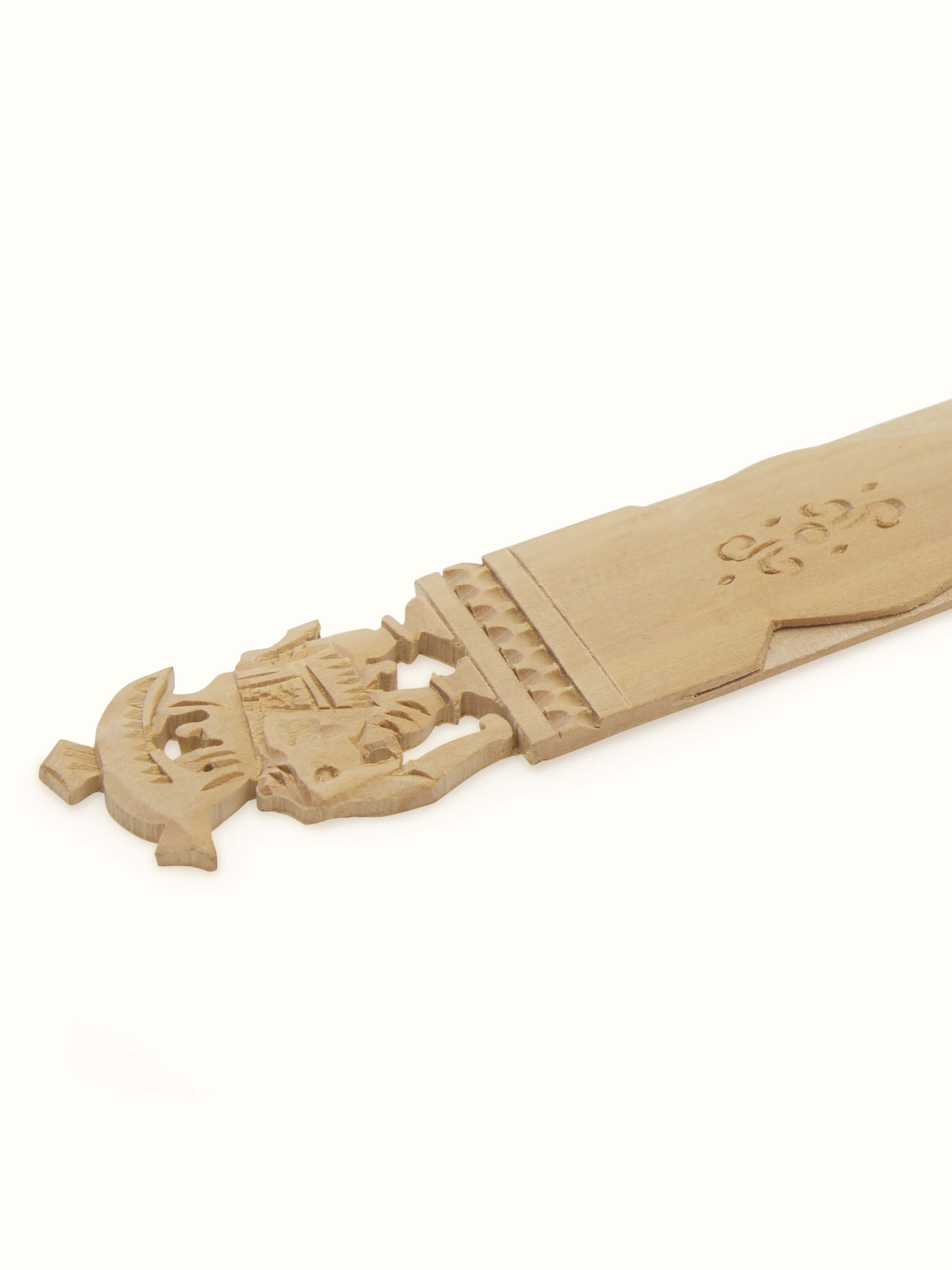 Side view of Carved Sandalwood Elephant Bookmark by Swadesh, focusing on the smooth finish and artistic design of the elephant carving.