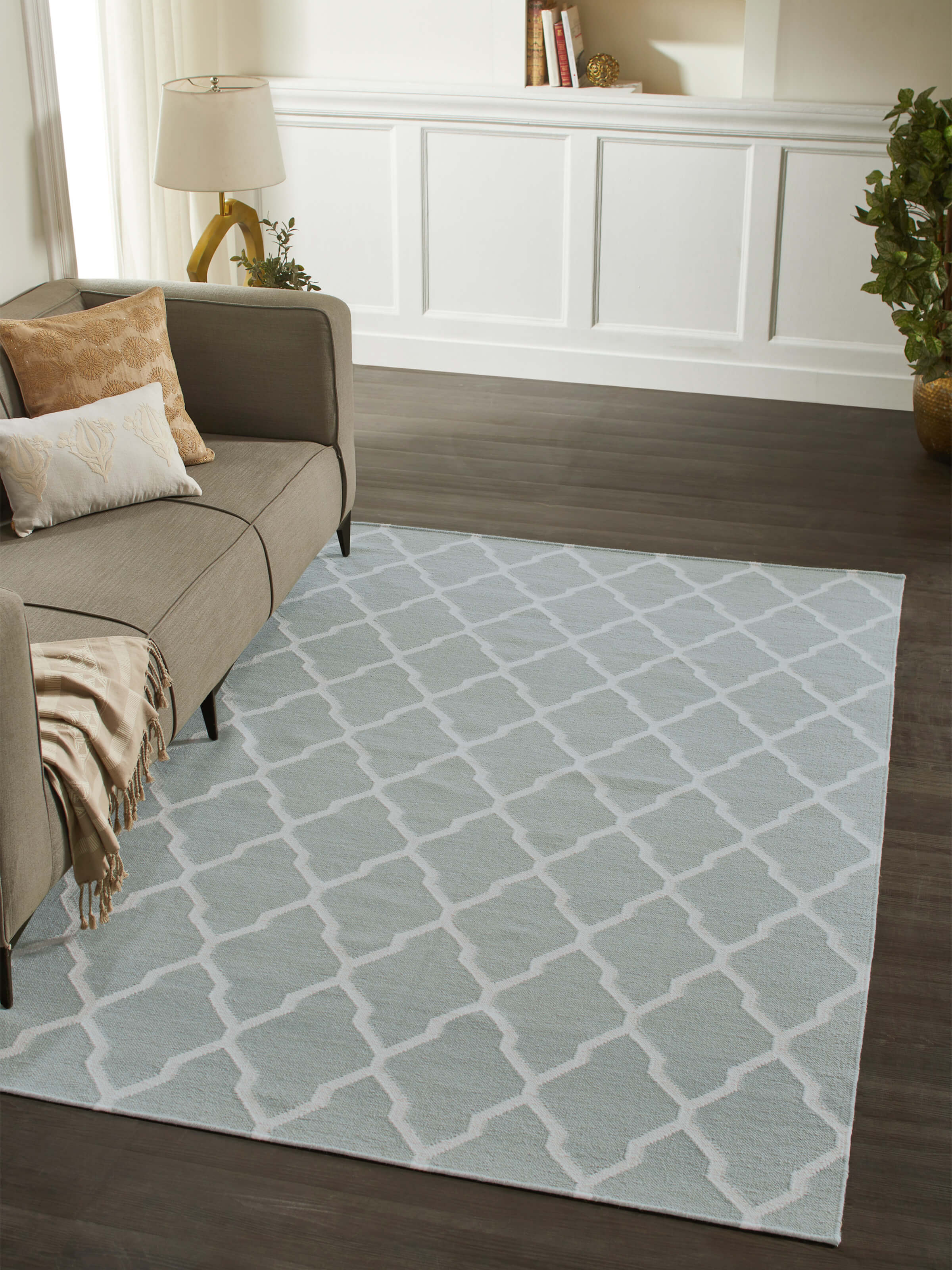 Top-down perspective highlighting the full dhurrie layout and subtle color blending