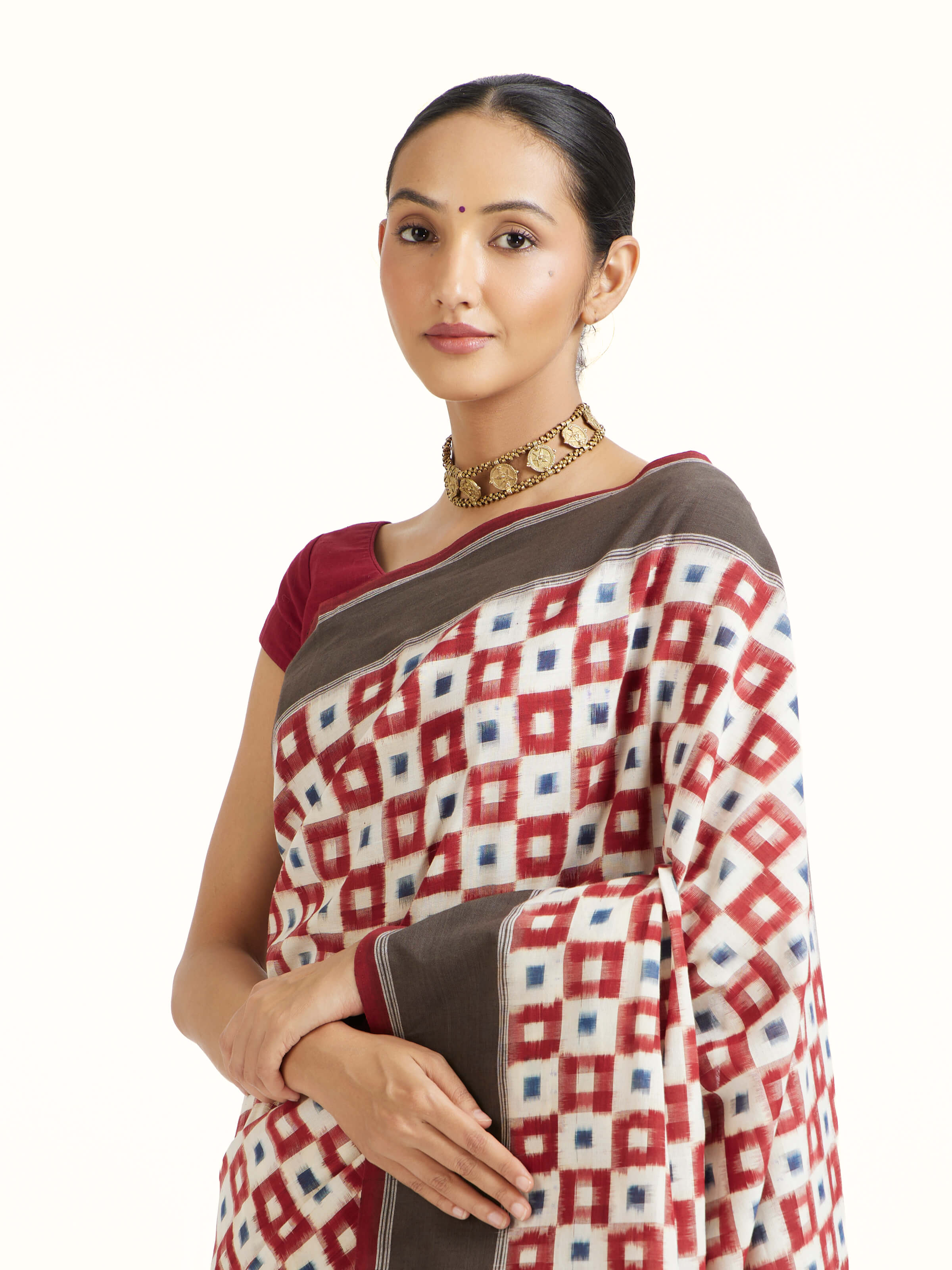 Angled view of the Brown Pochampally Ikat Handloom Cotton Saree