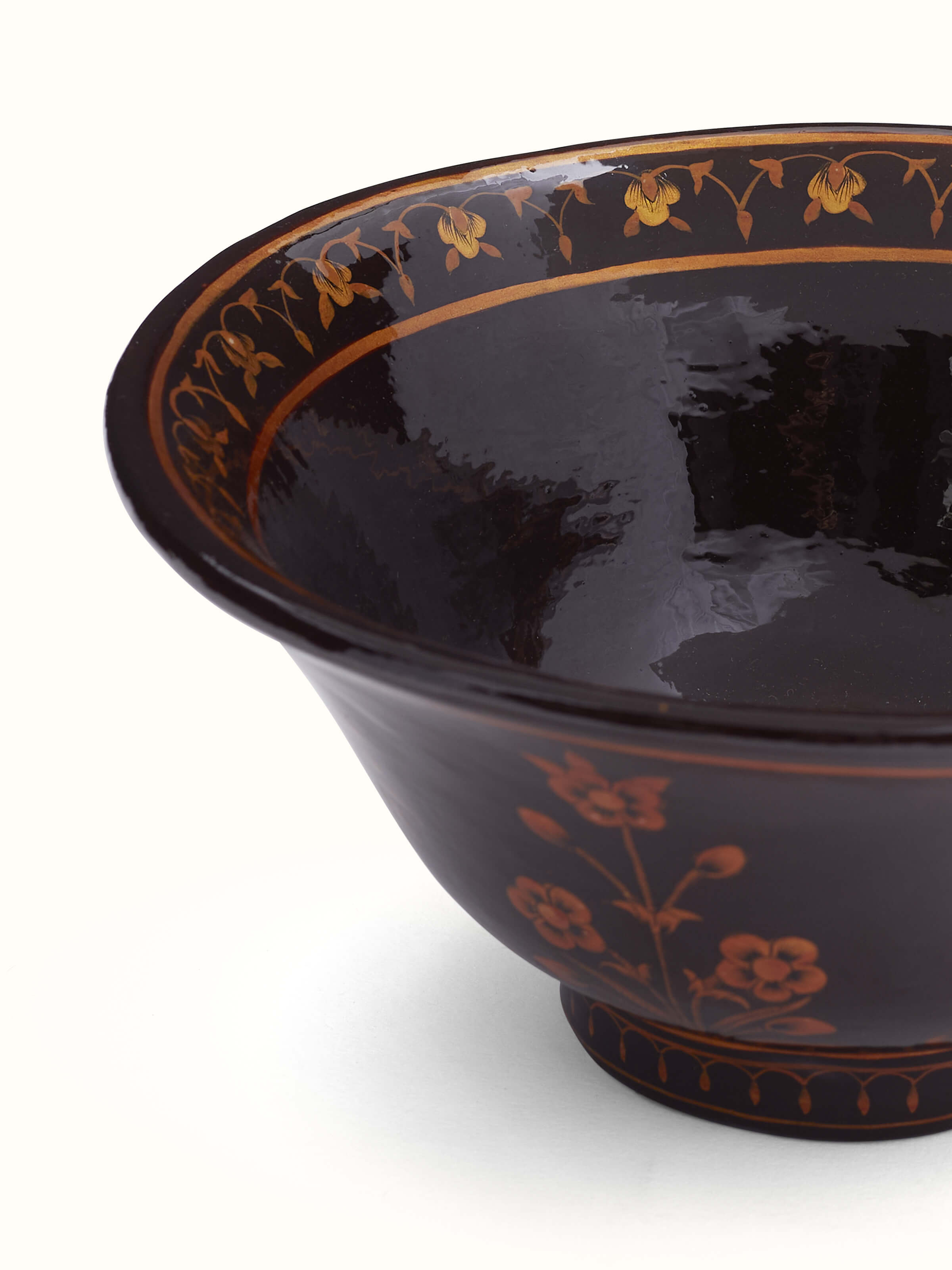 Detailed side view of a Black papier mache paper pulp bowl