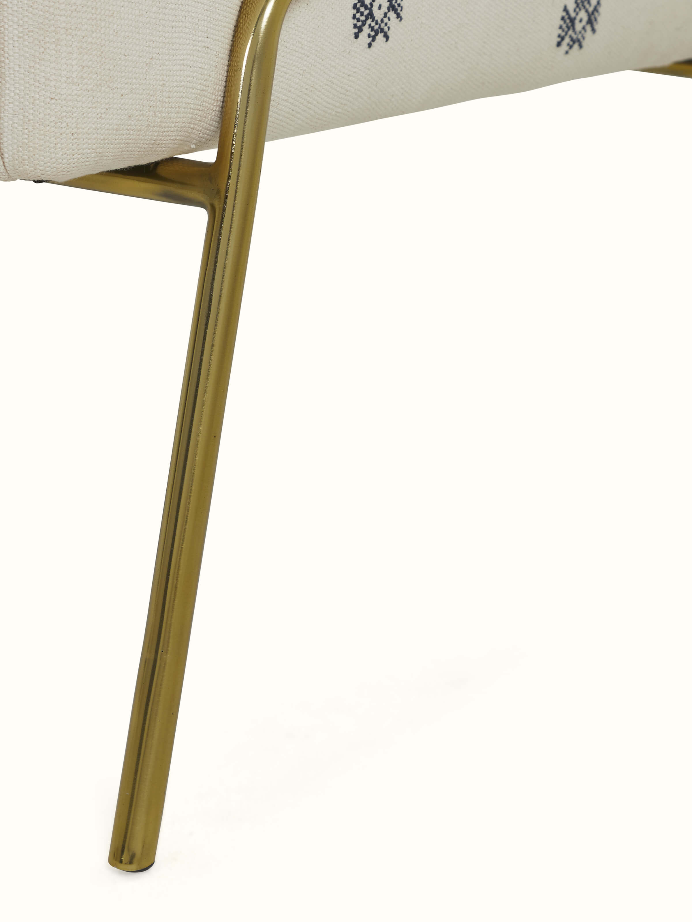 Base view of Upholstered Metal Lounge Chair showing the sturdy metal legs and overall modern design.