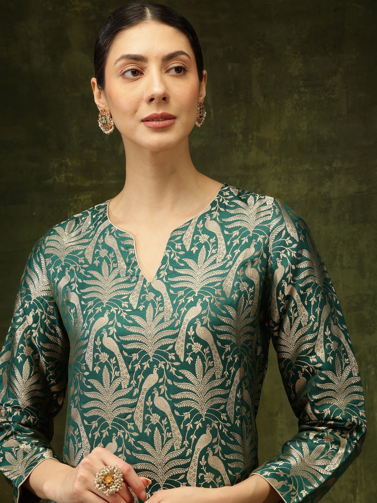 Angled view highlighting the Banarasi silk fabric and detailed embroidery on Green Kurta