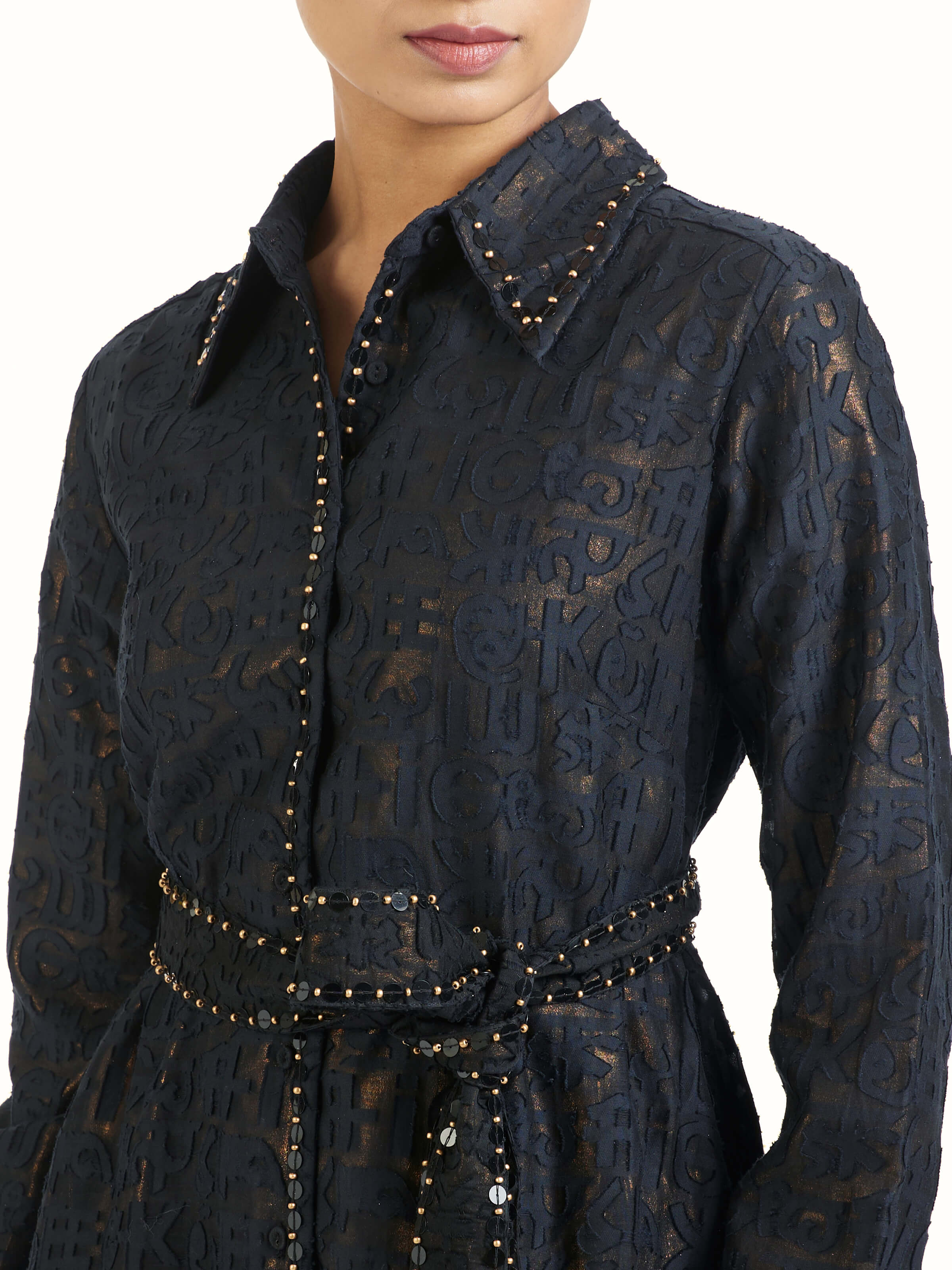 Detail view of black handloom cut work dress showcasing fine workmanship