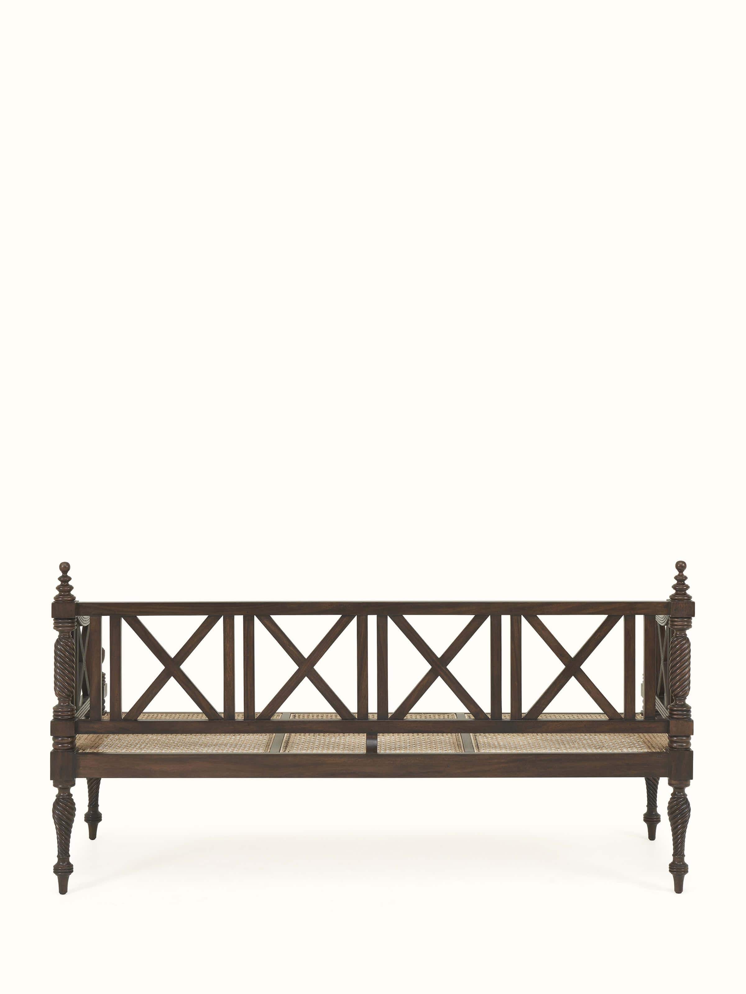 Back view of Walnut finish Mahogany wood and cane sofa showcasing structured design and polished wood back