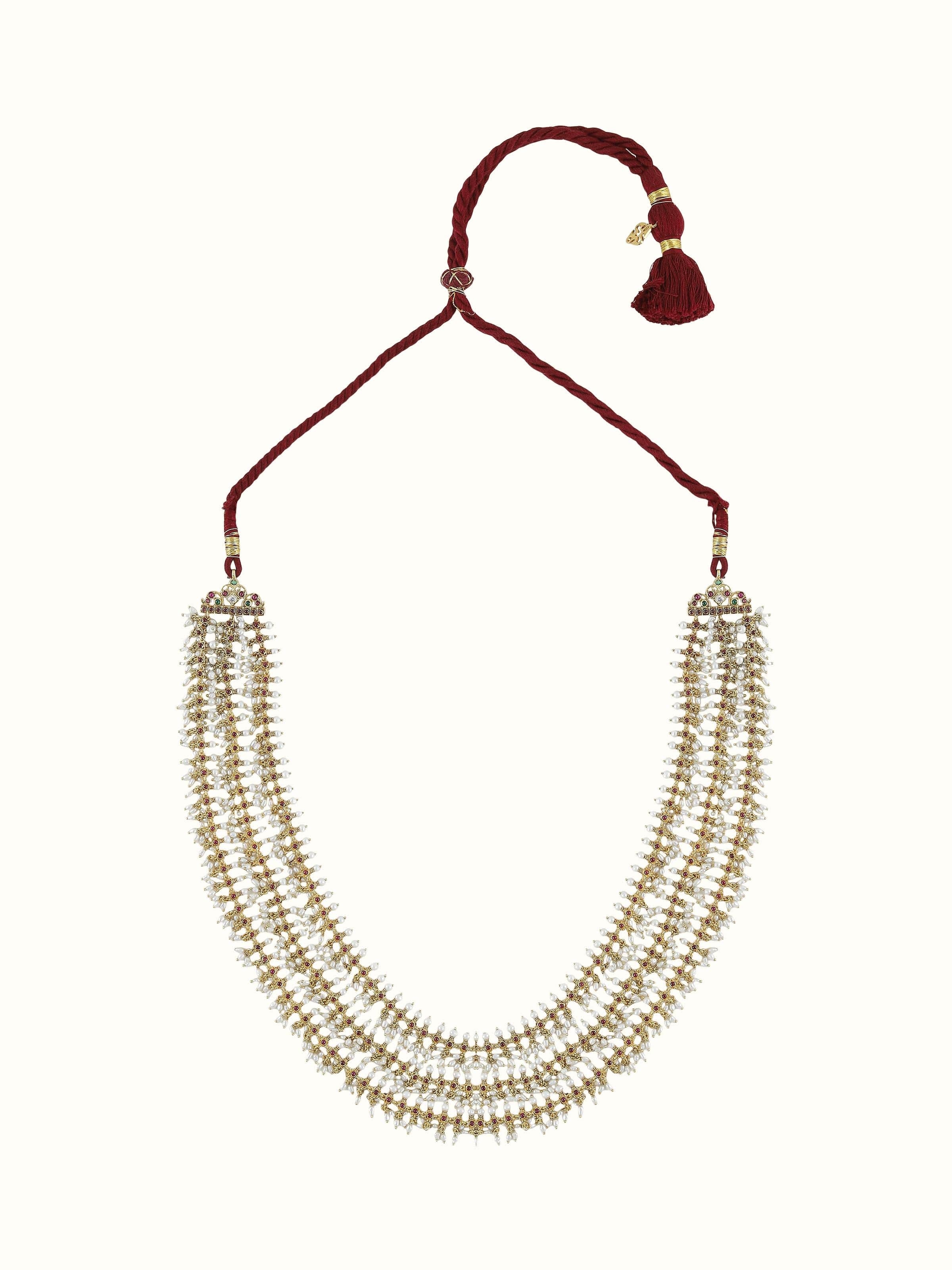 Front view of silver collar necklace with Guttapusalu design and pearl drop detailing