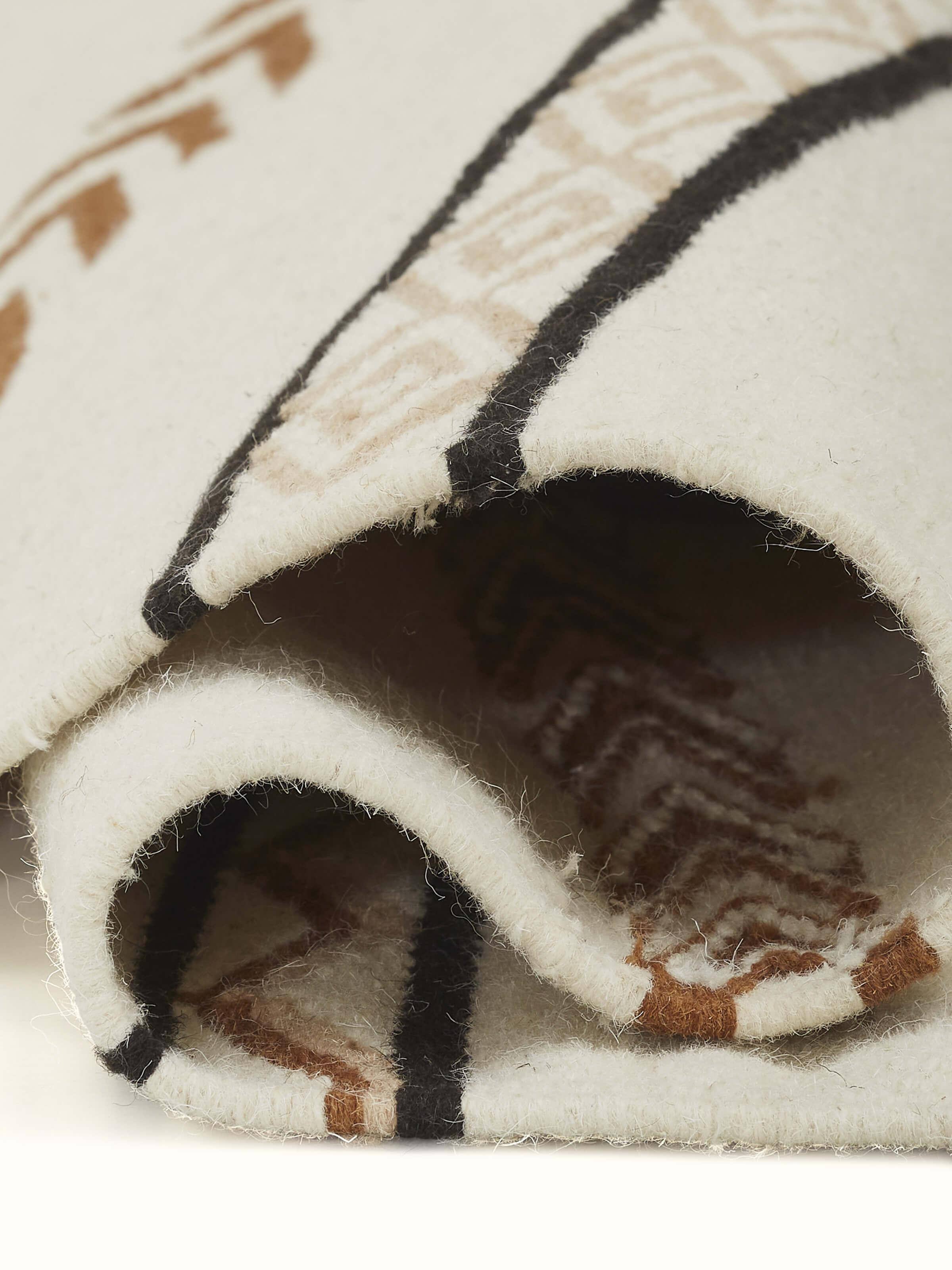 Detail shot 2: Edge detail of Panja runner revealing fine weaving and neat finish.