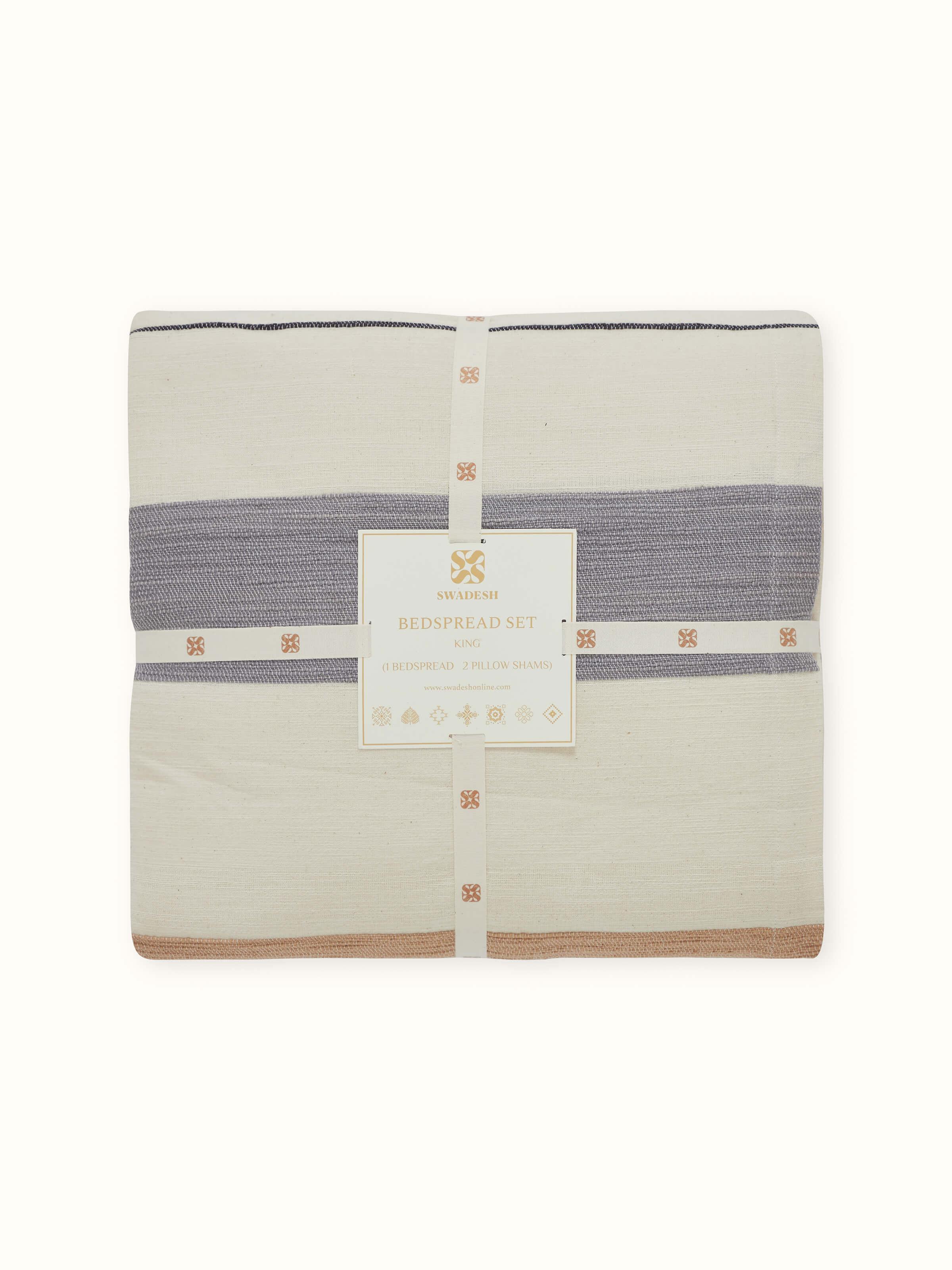 Detailed shot of Neerja Beige Stripe Cotton Bedspread Set, focusing on the soft cotton drape and striped surface.
