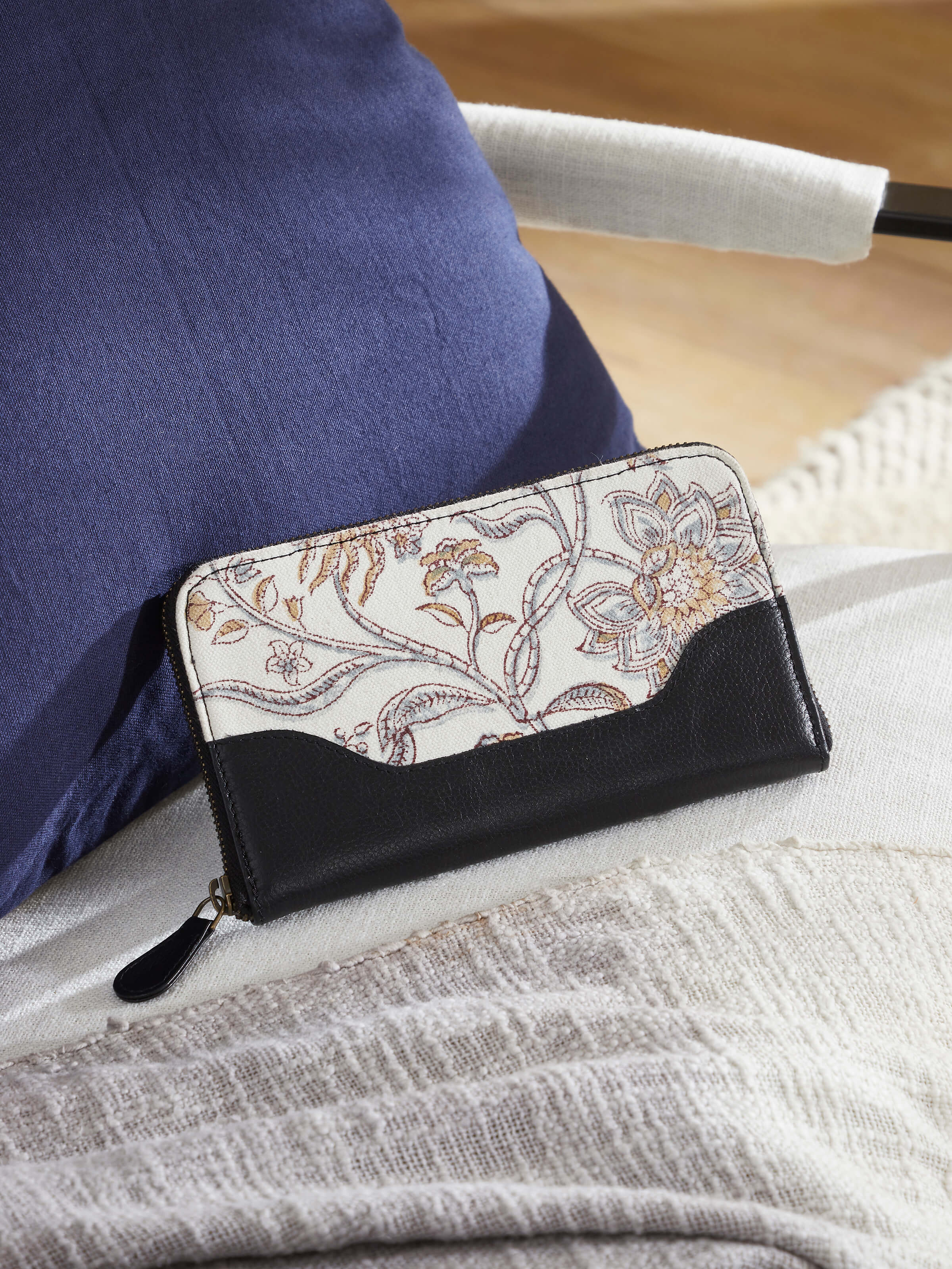 Lifestyle image showing the wallet in use, emphasizing its ethnic design.