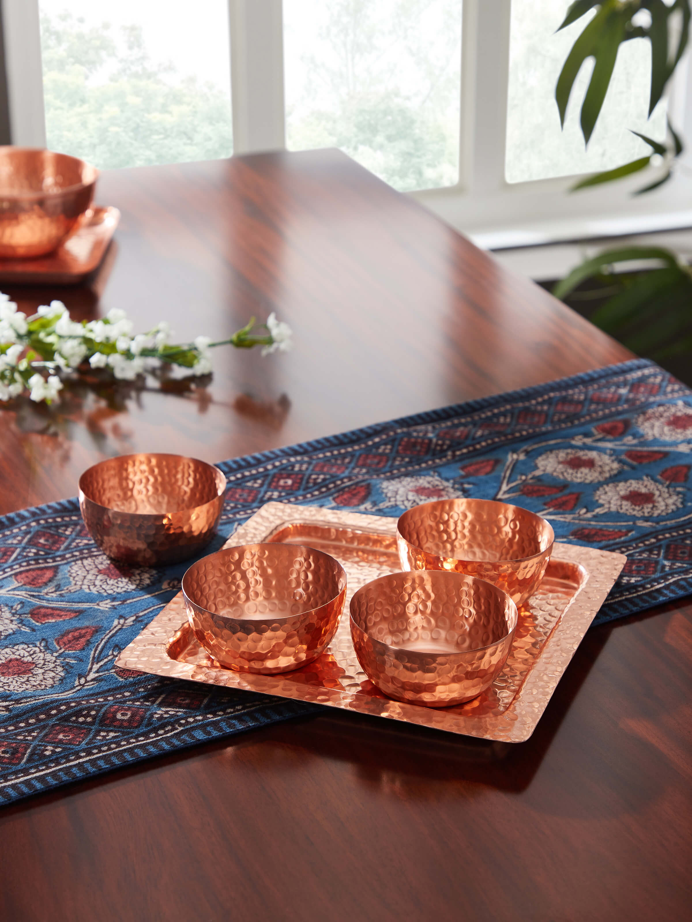 Side view of Copper Condiment Container Set (4 Pcs) by Swadesh displaying the four condiment containers and intricate design.