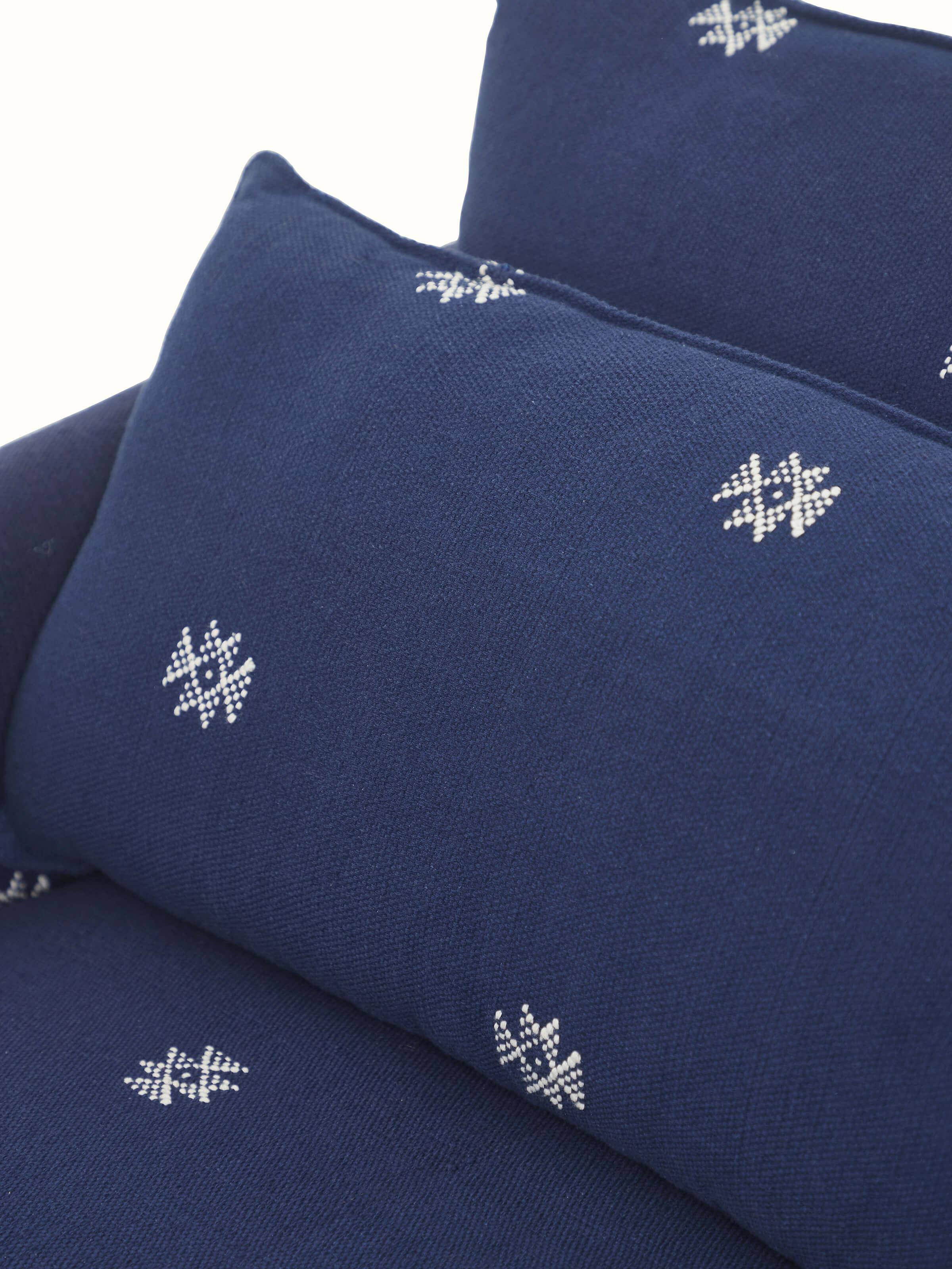 Detailed view of Upholstered Metal Armchair focusing on the quality upholstery and metal craftsmanship.