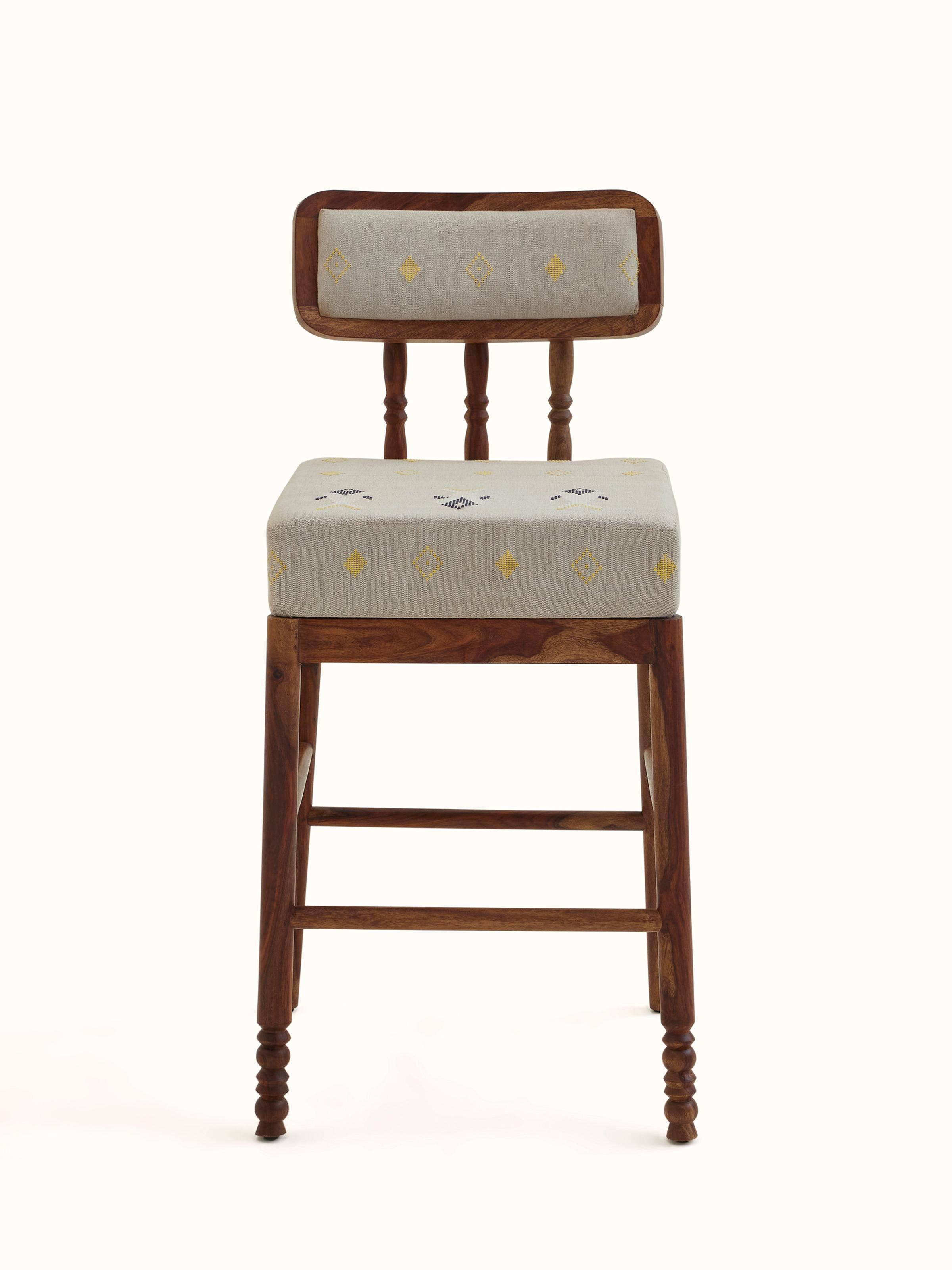 Front view of Upholstered Sheesham Wood Bawan Buti Bar Stool showcasing detailed design