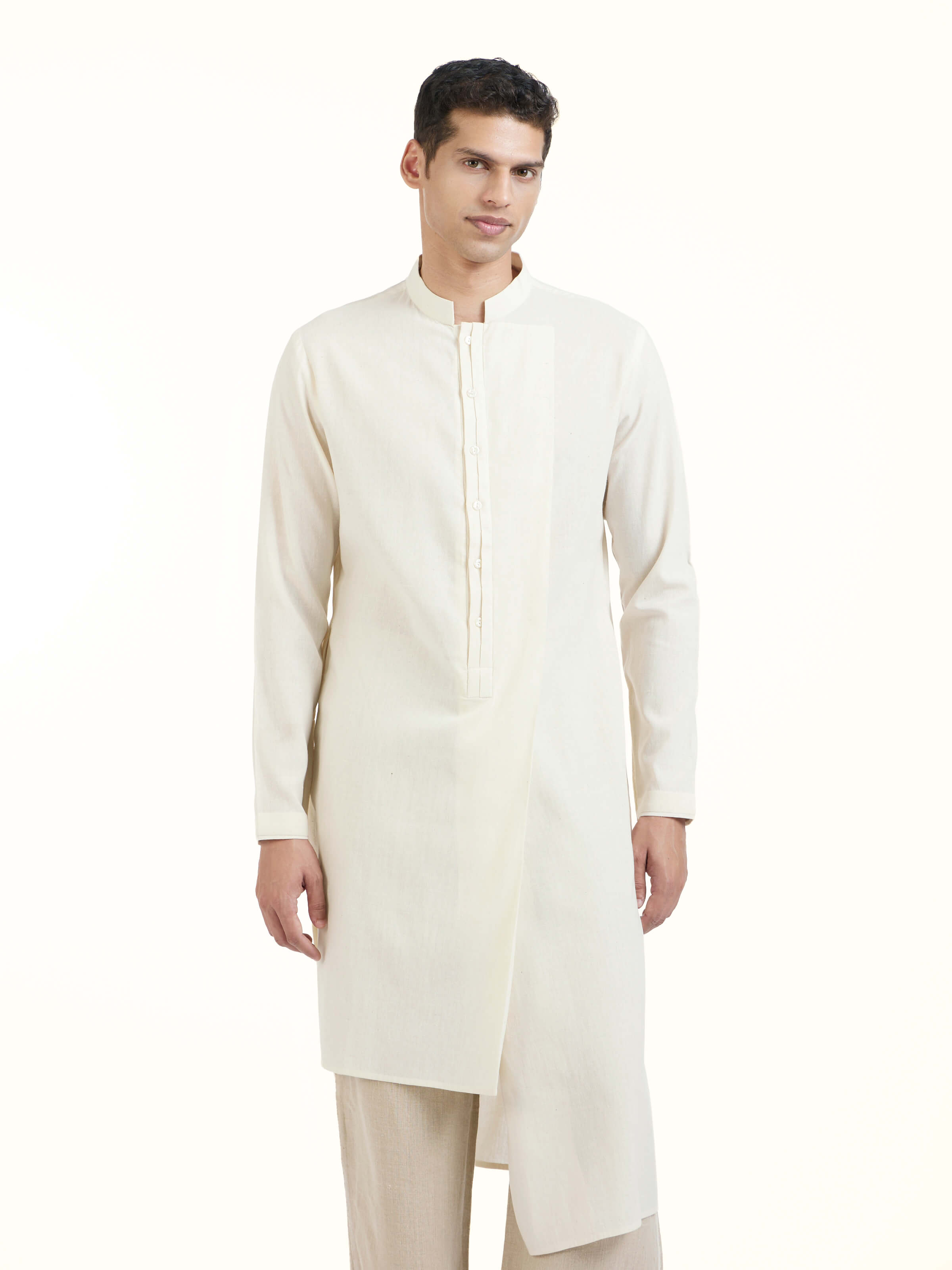 Angled view of peach silk handloom long kurta highlighting fabric texture