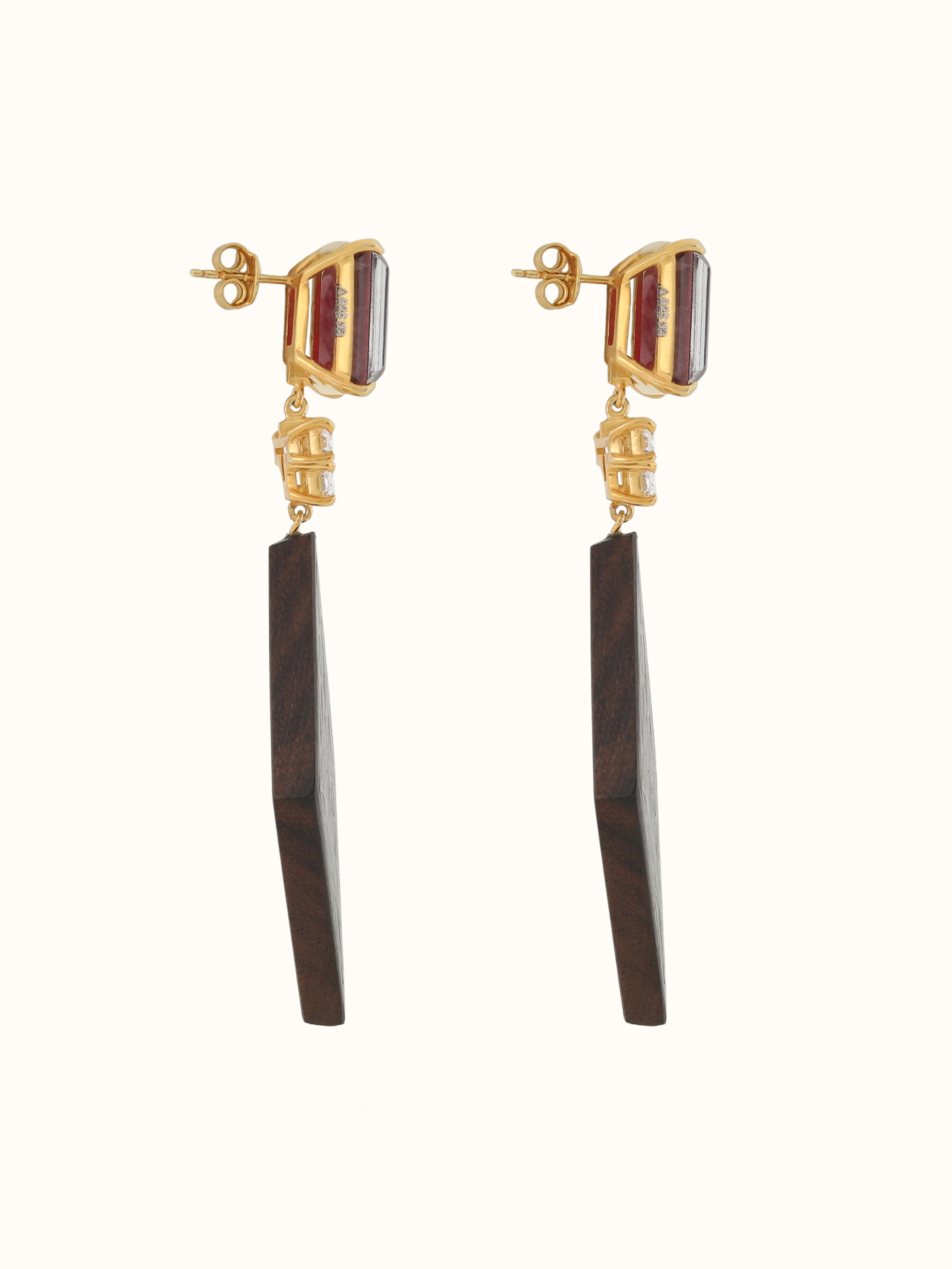 Side view of Tarkashi silver drop earrings showing detailed silverwork and traditional design