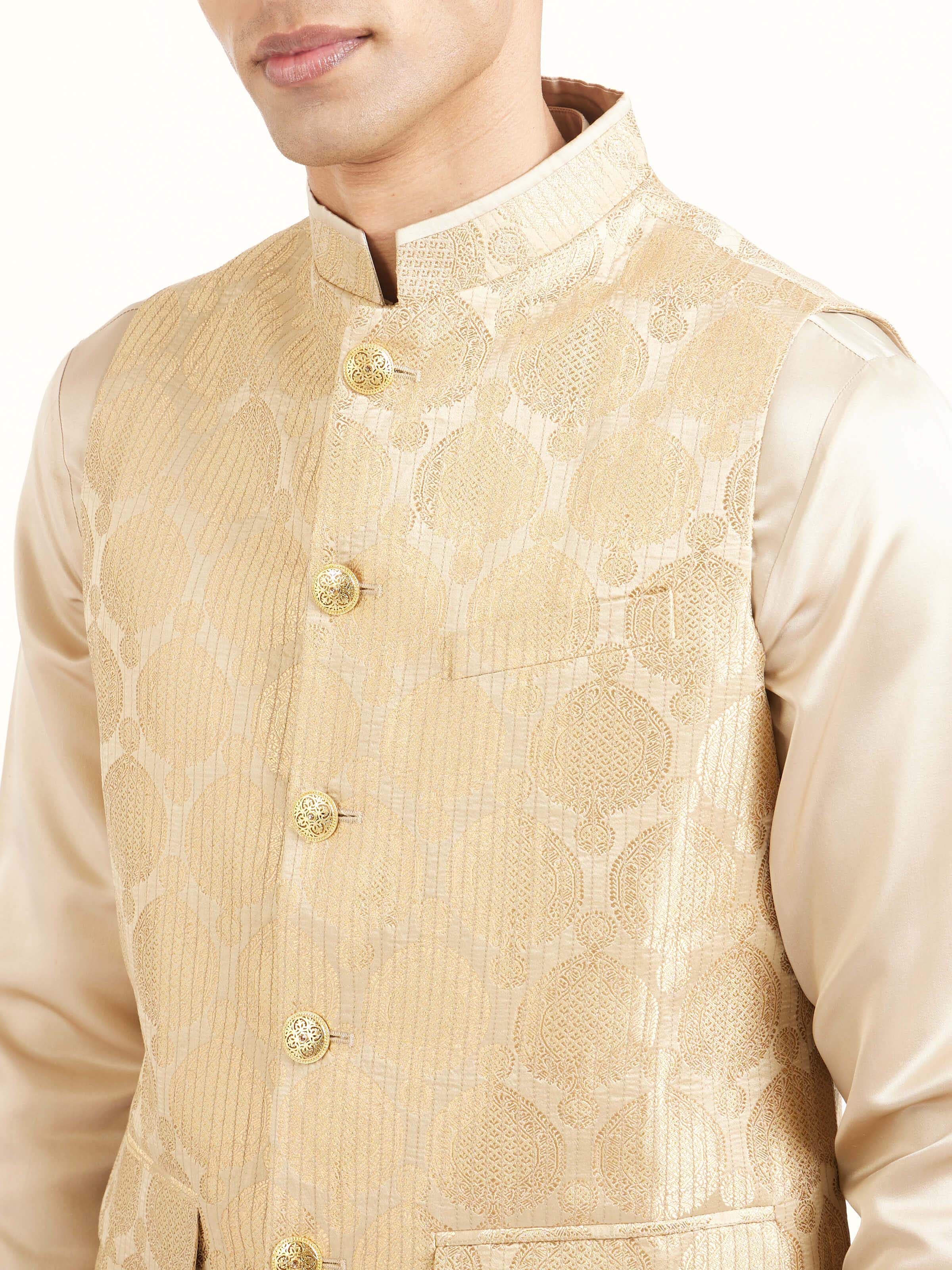 Detail view of beige silk Banarasi sleeveless jacket showing silk texture and craftsmanship