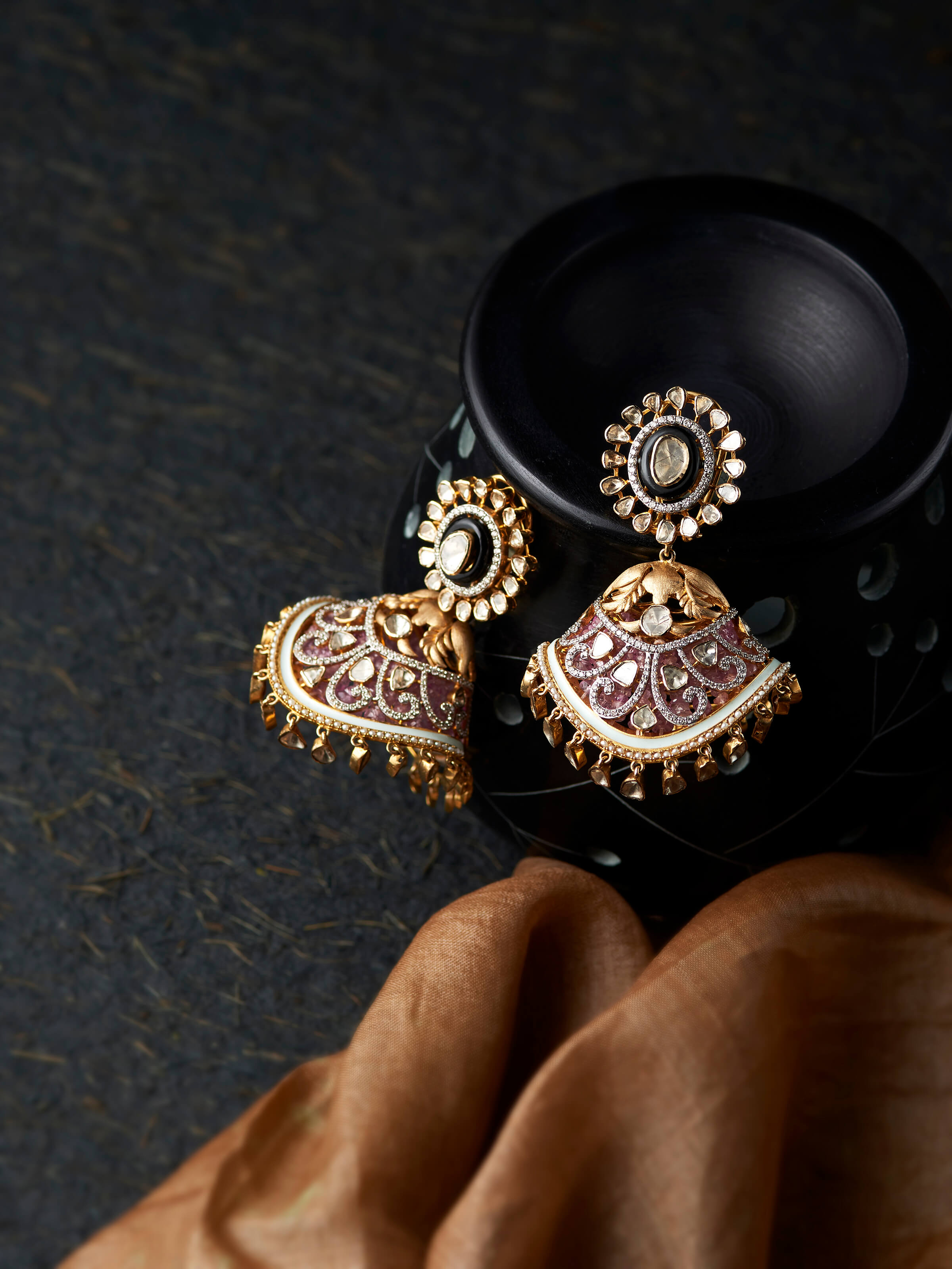 lifestyle view of open setting 14 karat gold drop earrings