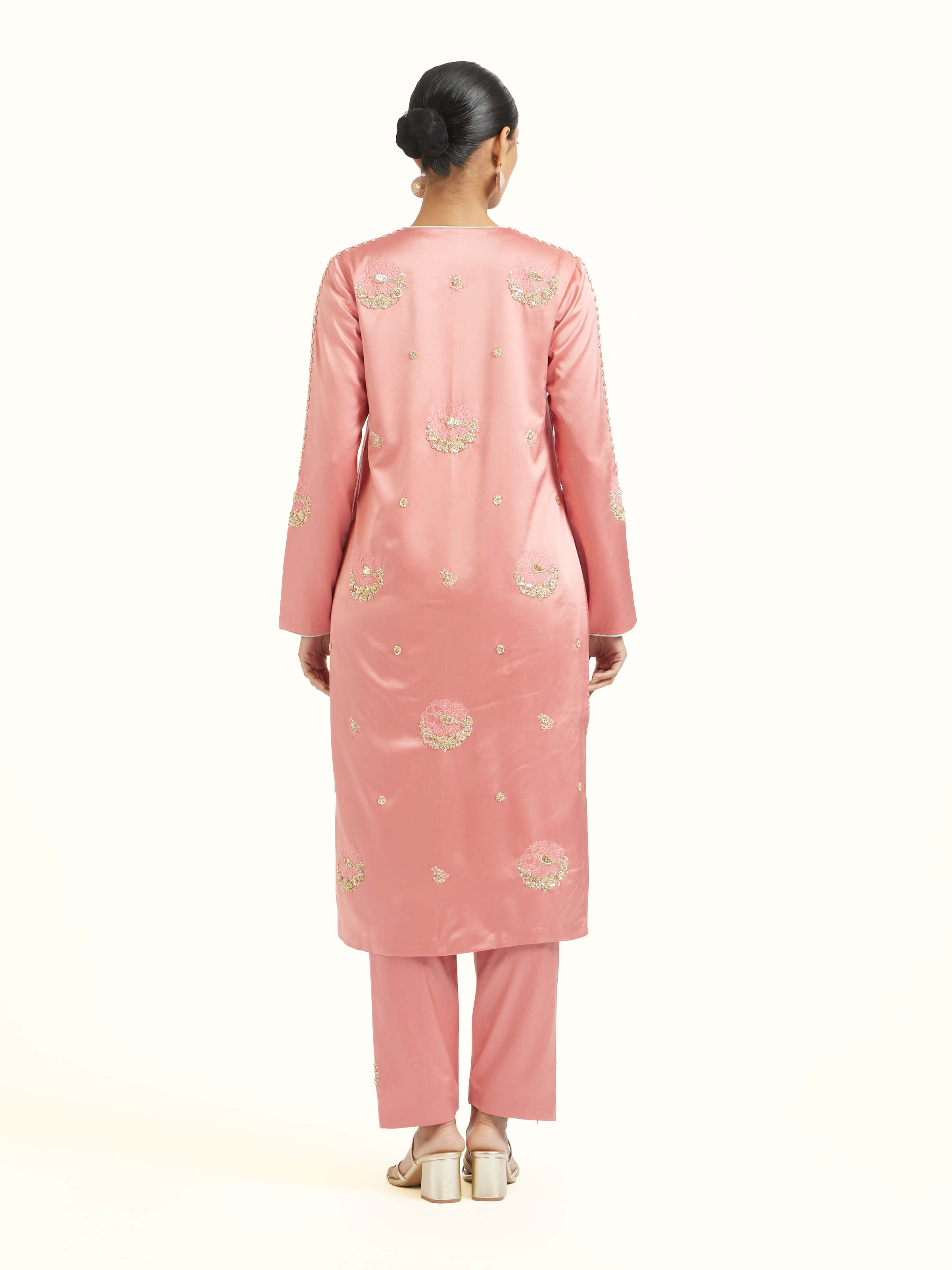 Back view of orchid pink zardozi kurta set displaying complete ensemble