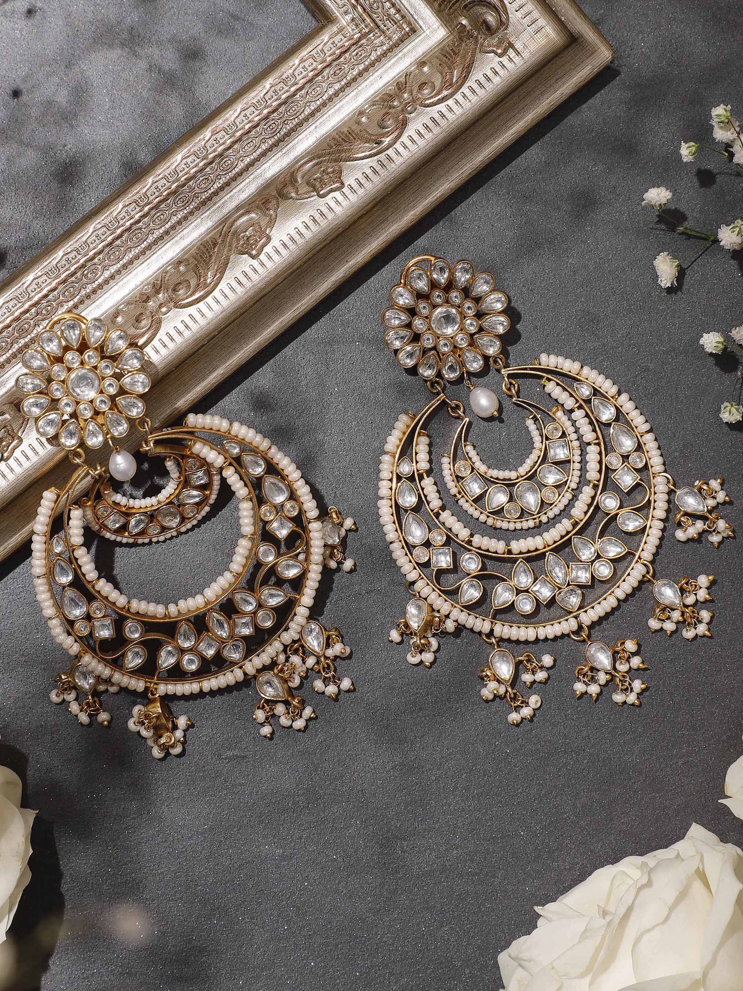 Side profile shot displaying the elegant drop structure and unique detailing.