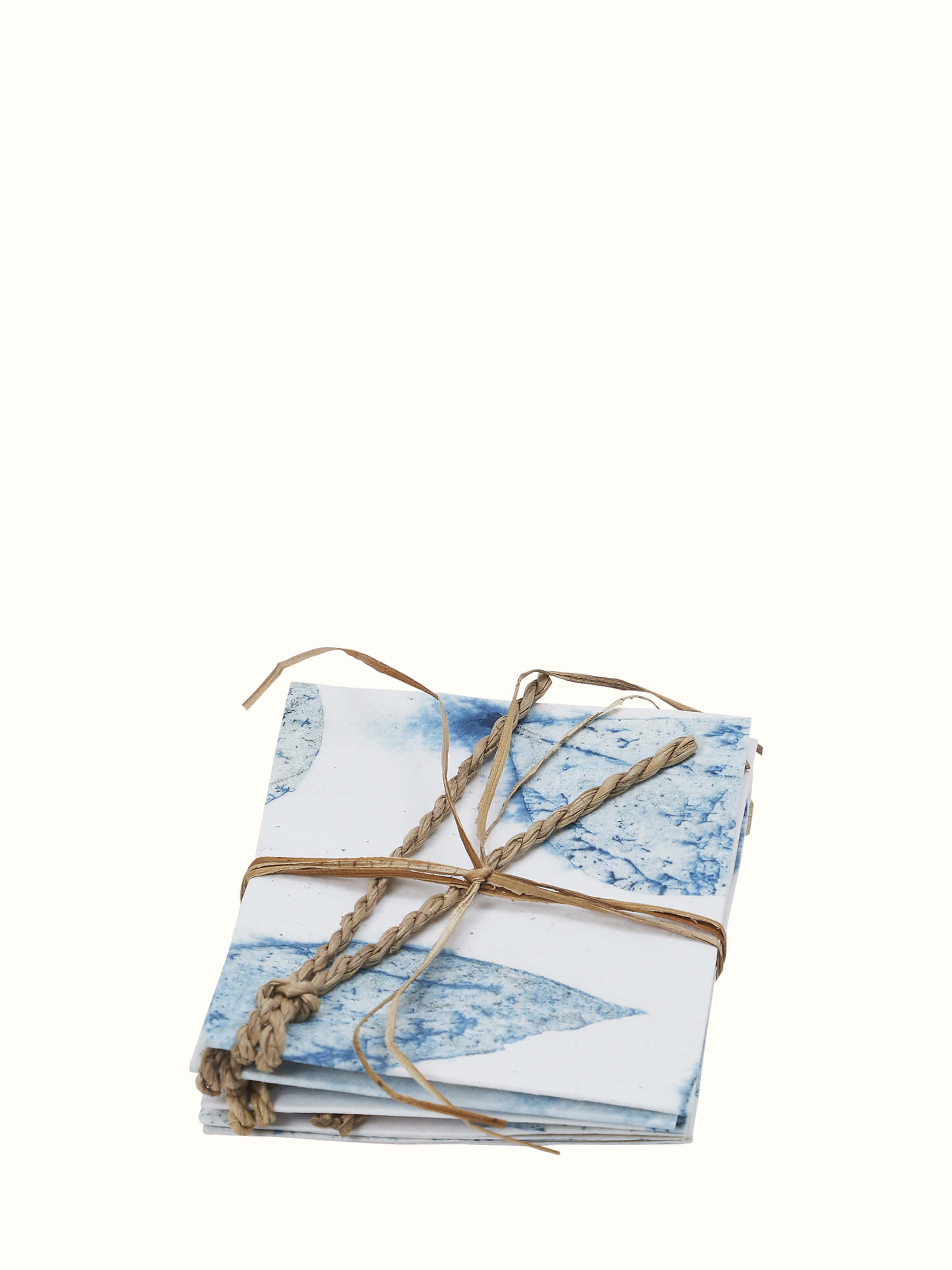 Angled view of Auroville Handmade Paper Gift Tags Blue (5 Pcs) showcasing the unique and eco-friendly gift tag design