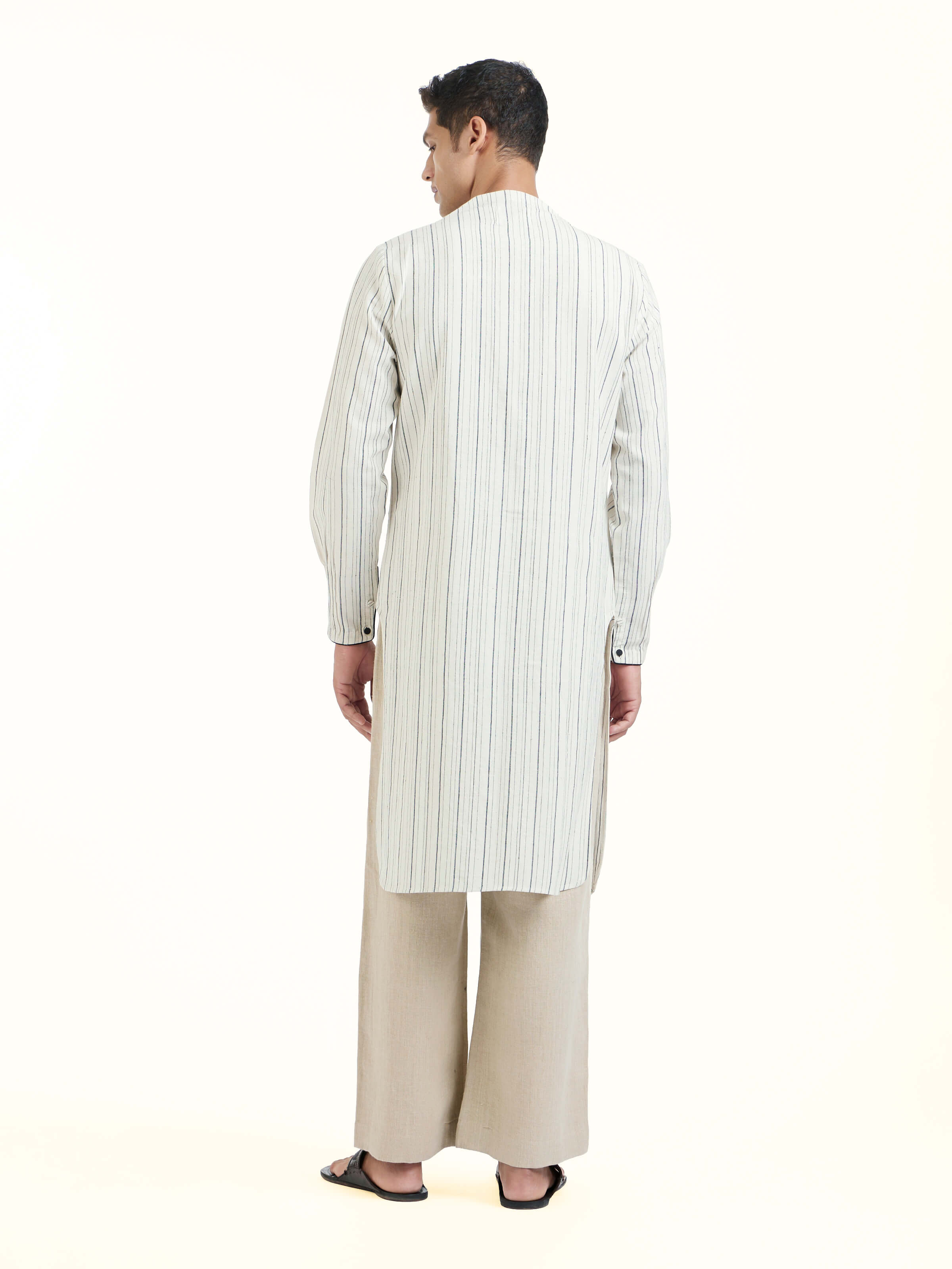 Back view of ivory silk handloom kurta showing full length design
