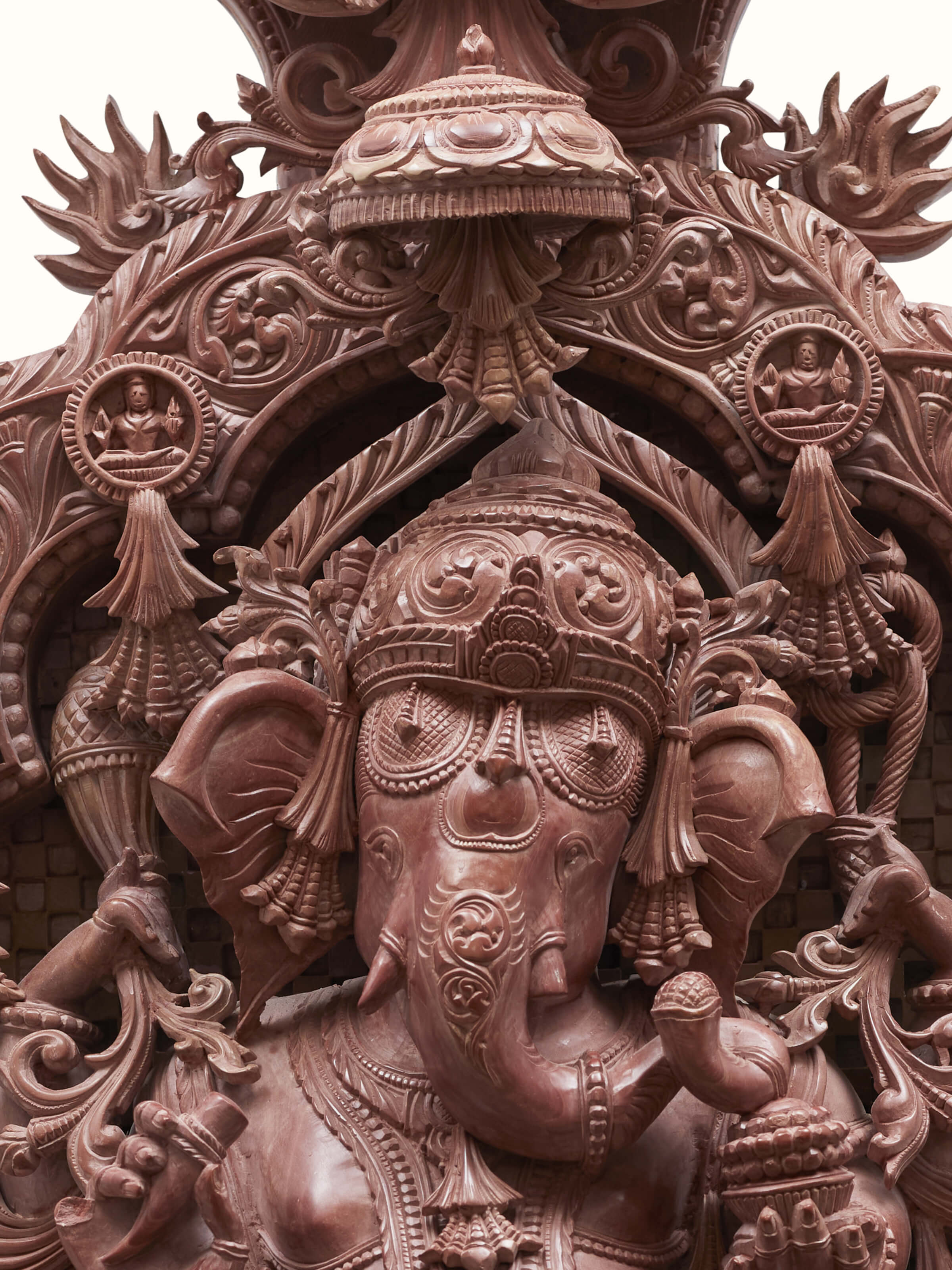 Angled view of Stone Ganesha Idol revealing the overall artistry and detailed carving