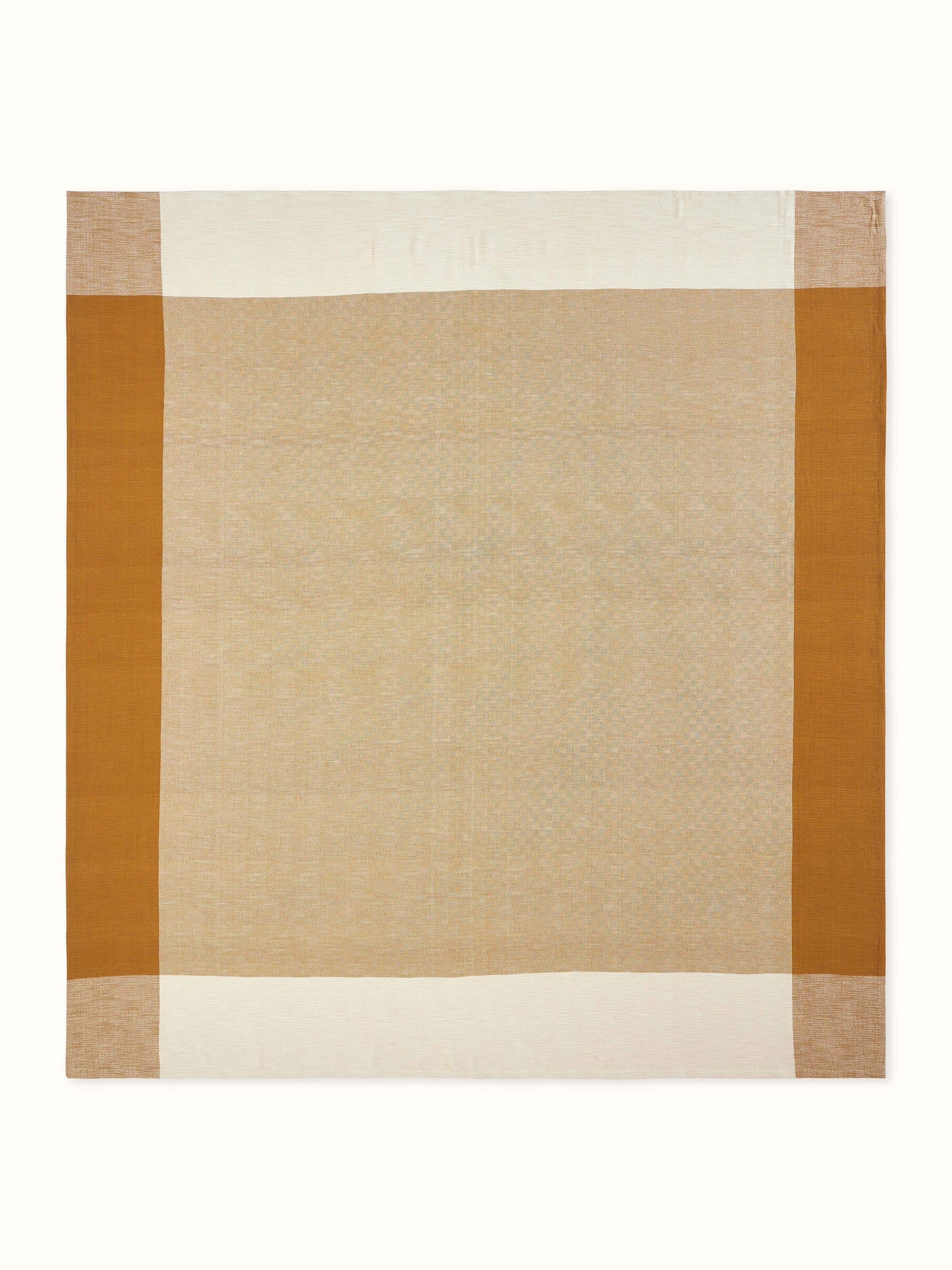 Alternate front: Neerja bedspread in soft yellow, shown neatly spread over king-size bed.